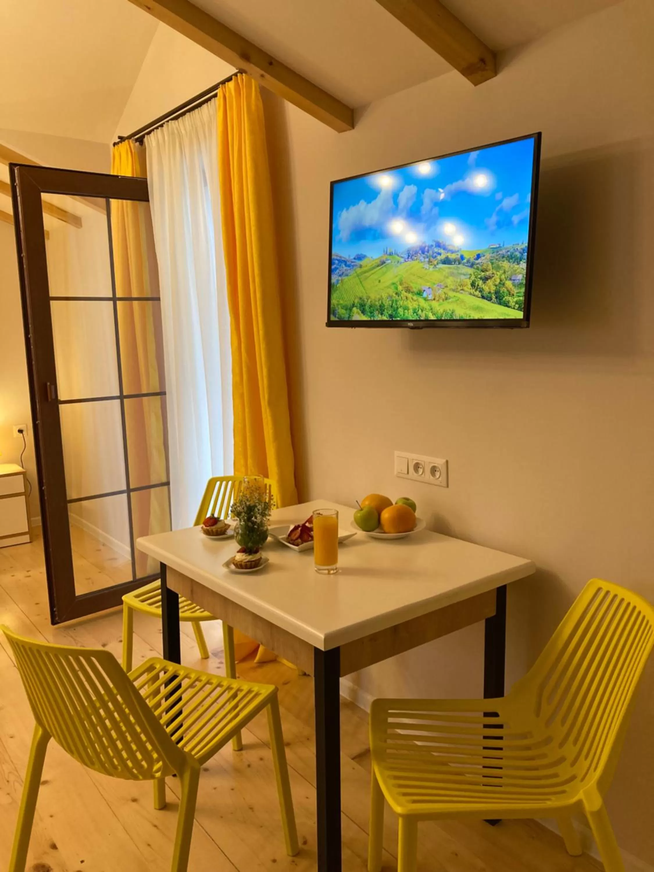 TV/Entertainment Center in Borjomi Yellow Hotel