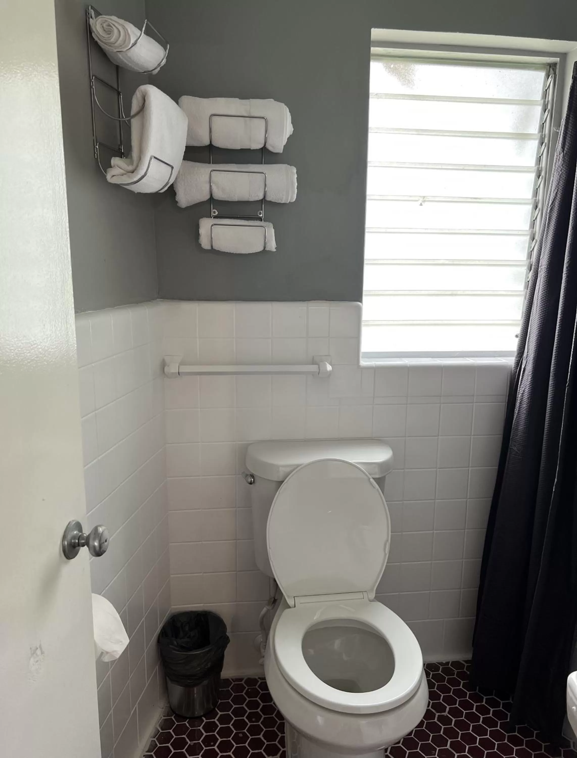 Toilet in BlueGem Motel