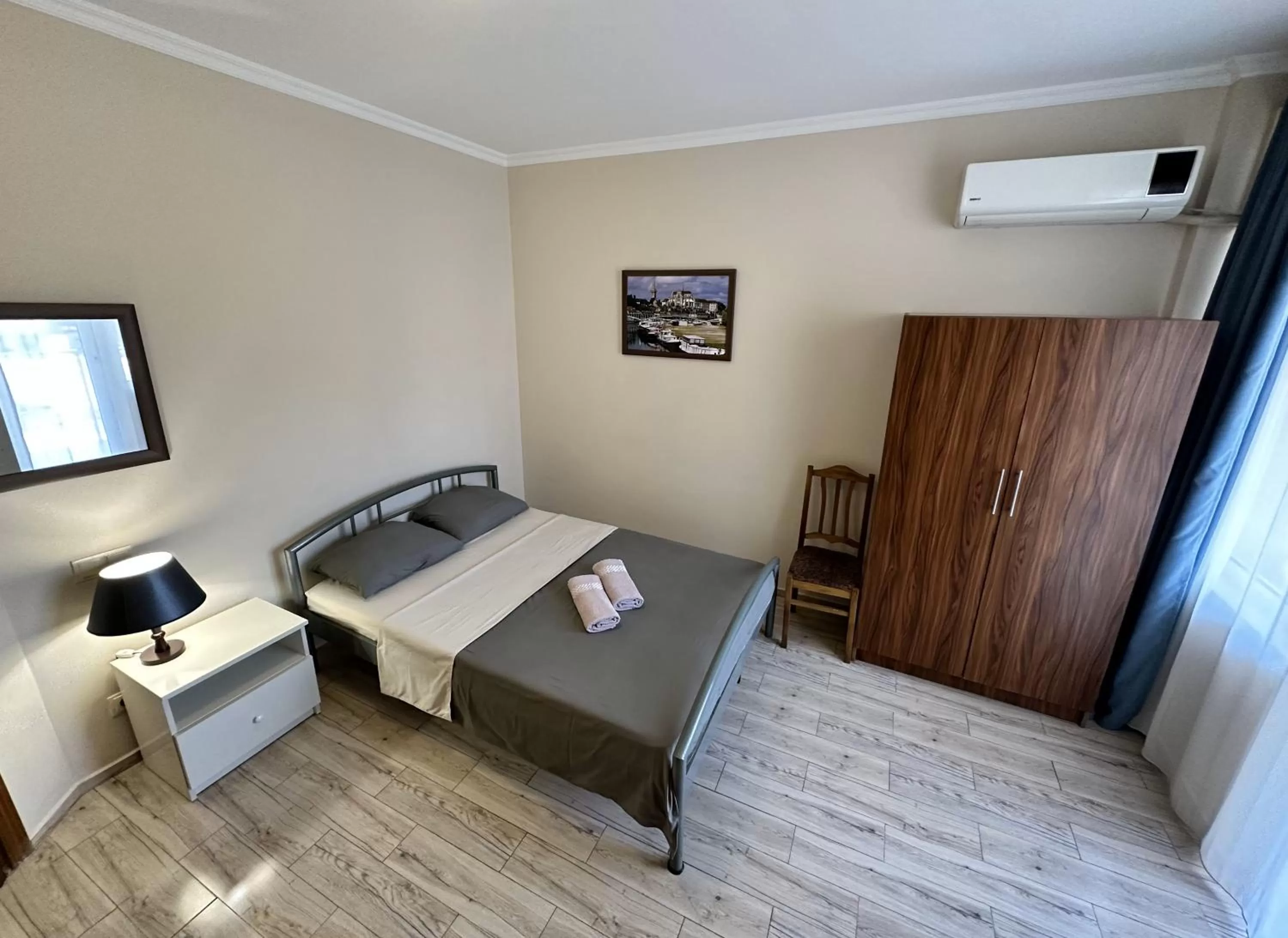 Photo of the whole room, Bed in National+