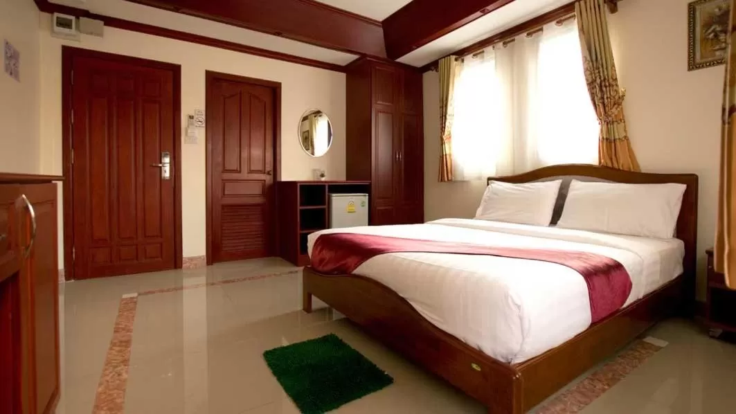 Bed in Bluebird Inn Pattaya