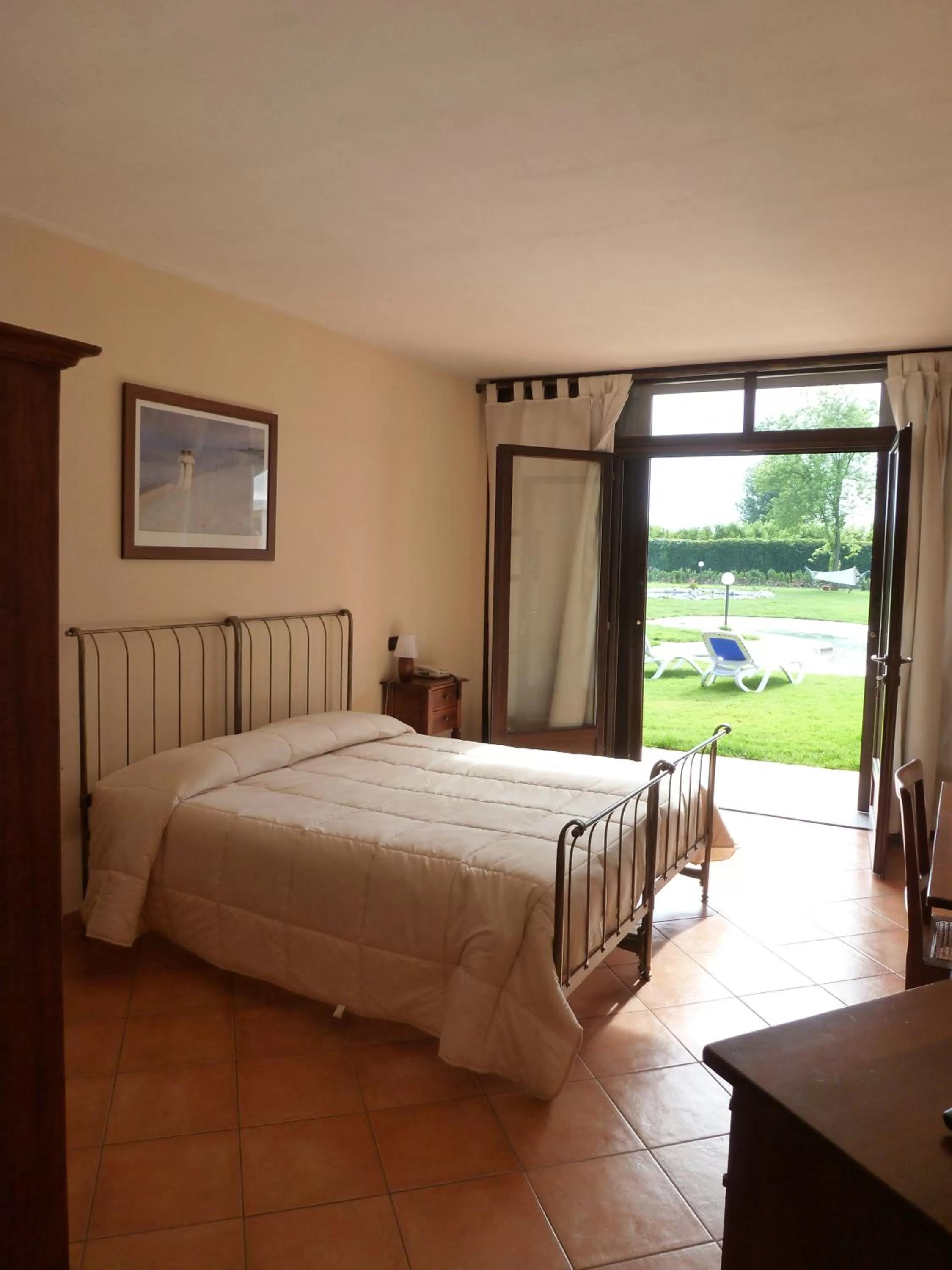 Bed in Albergo Cosmera