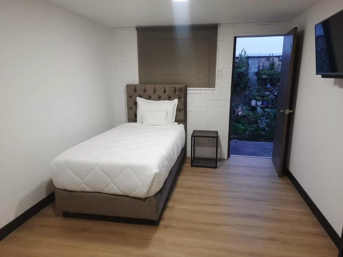 Bed in HOTEL GALLERY URBAN