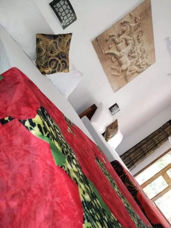 Bed in The Horizon Root Inn