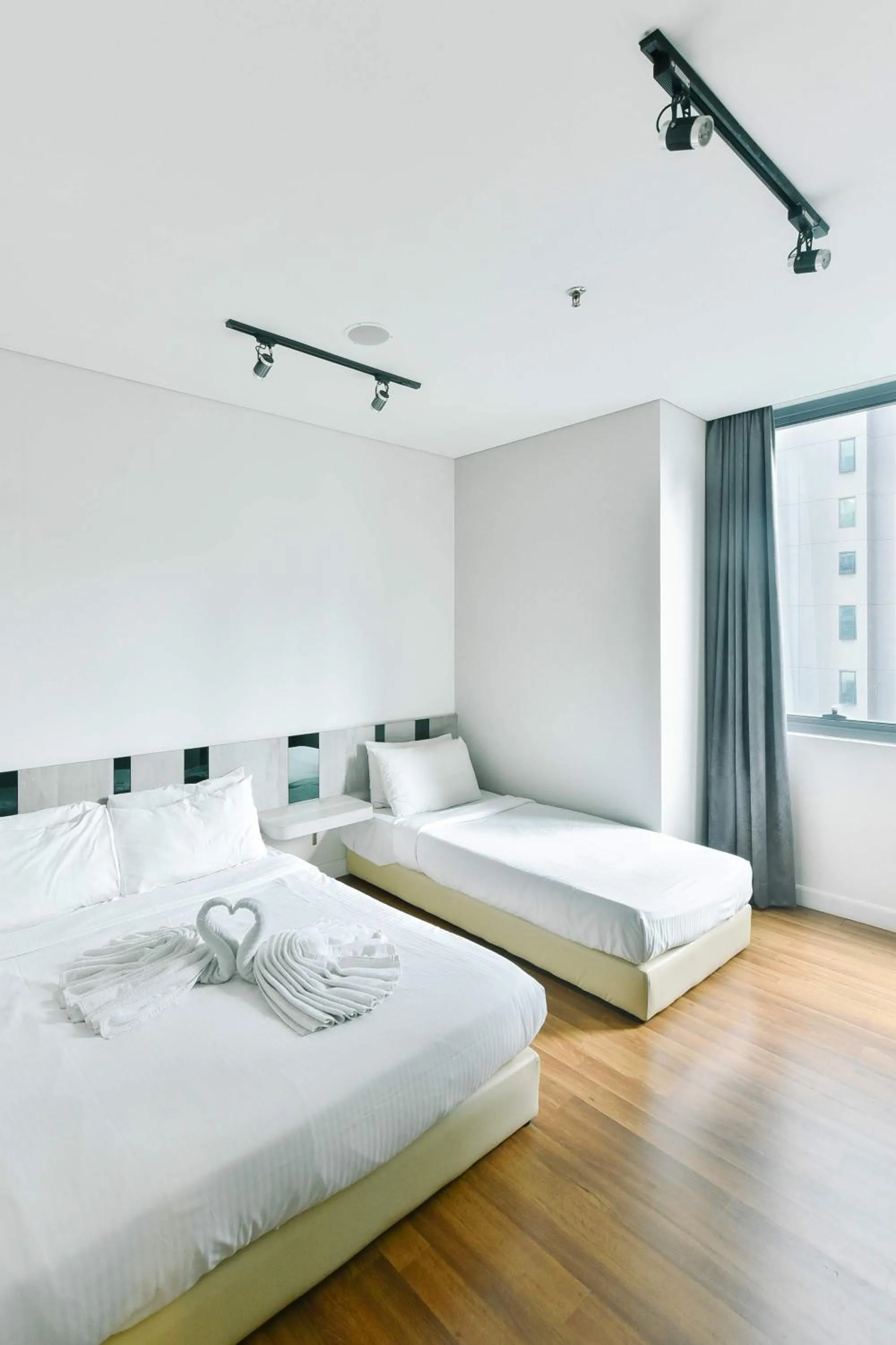 Bedroom in Summer Suites Residences by Subhome