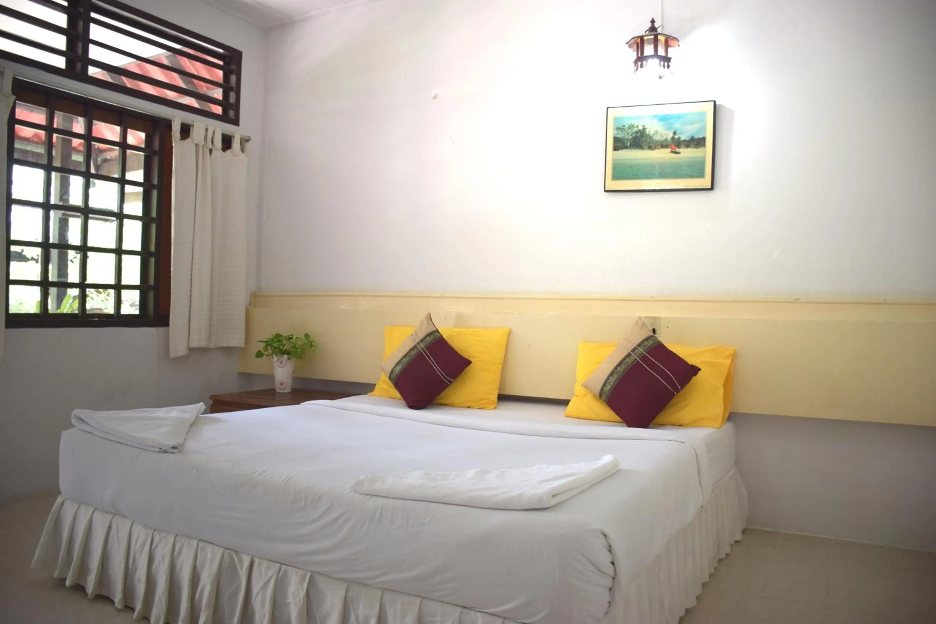 Bed in Marine Chaweng Beach Resort