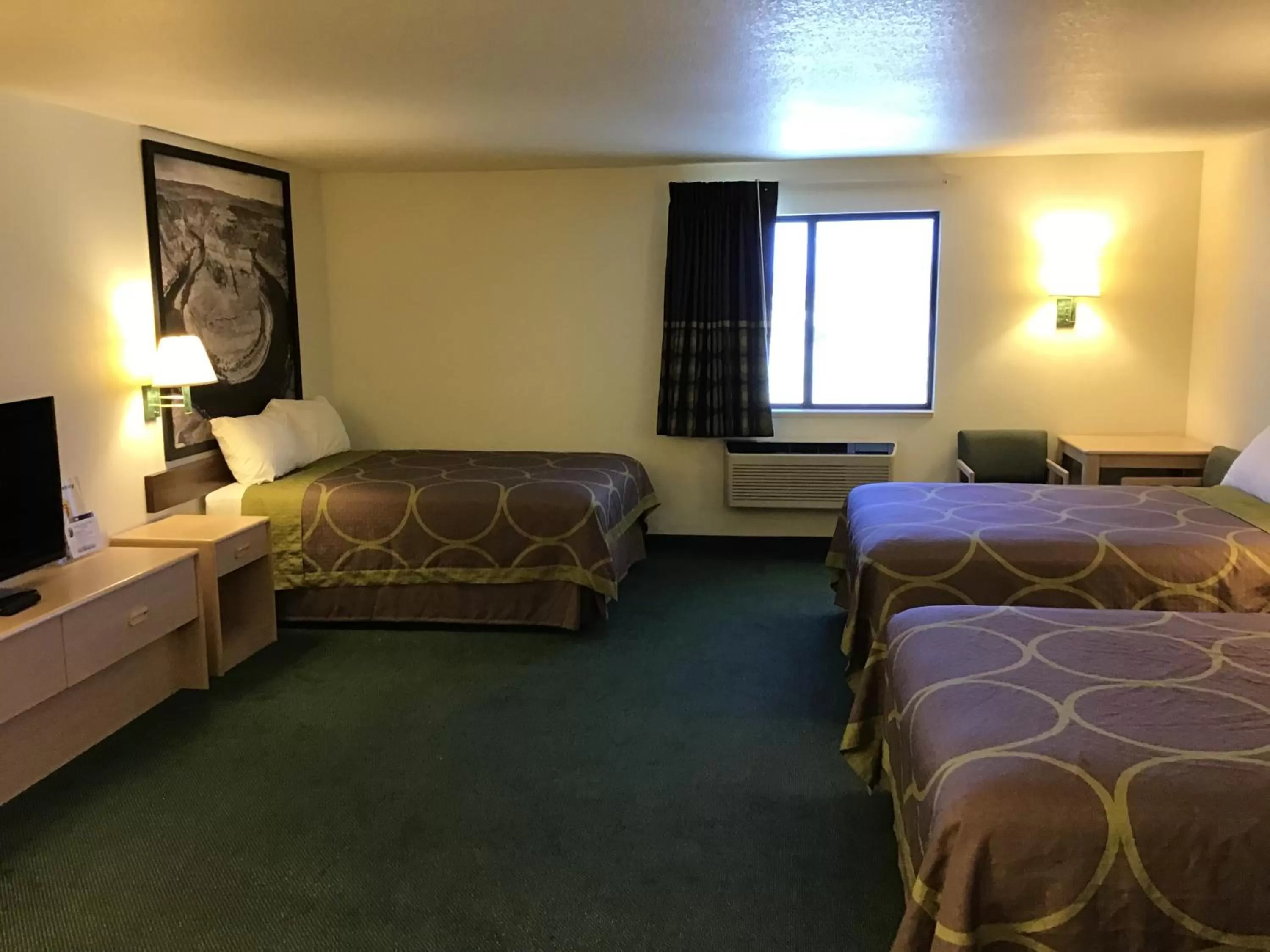 Bed in Arch Canyon Inn