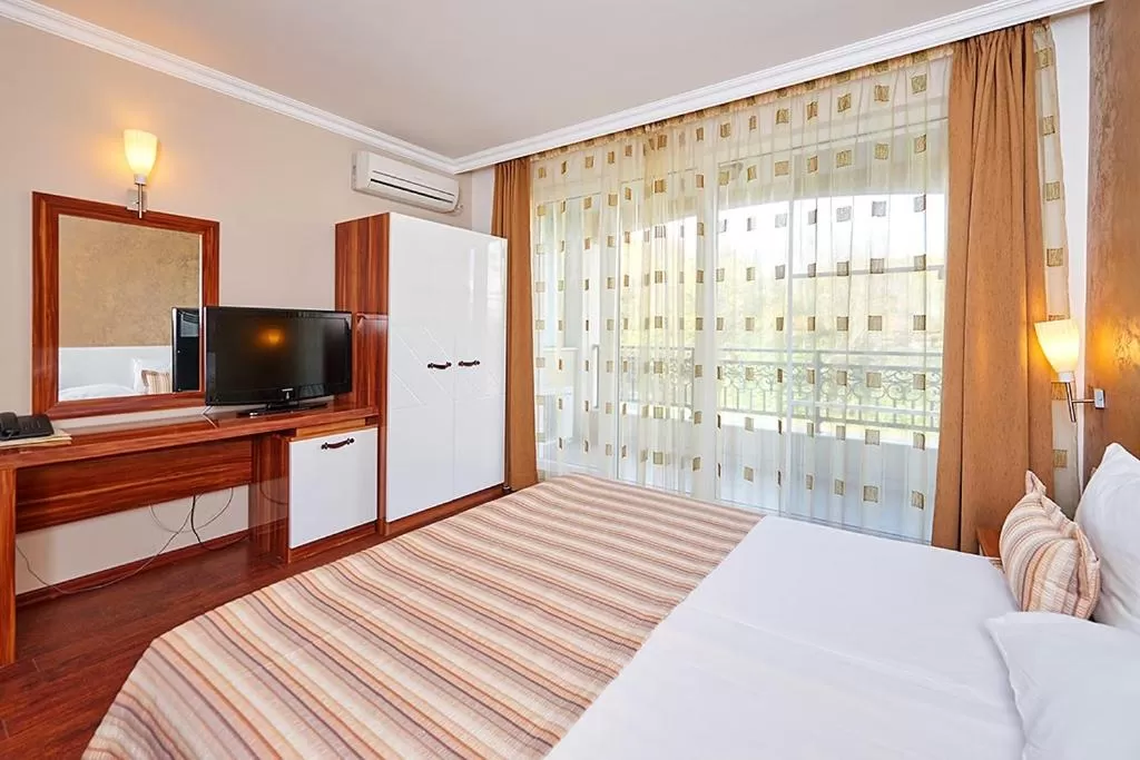 Photo of the whole room, Bed in Penelopa Palace Apart Hotel & SPA