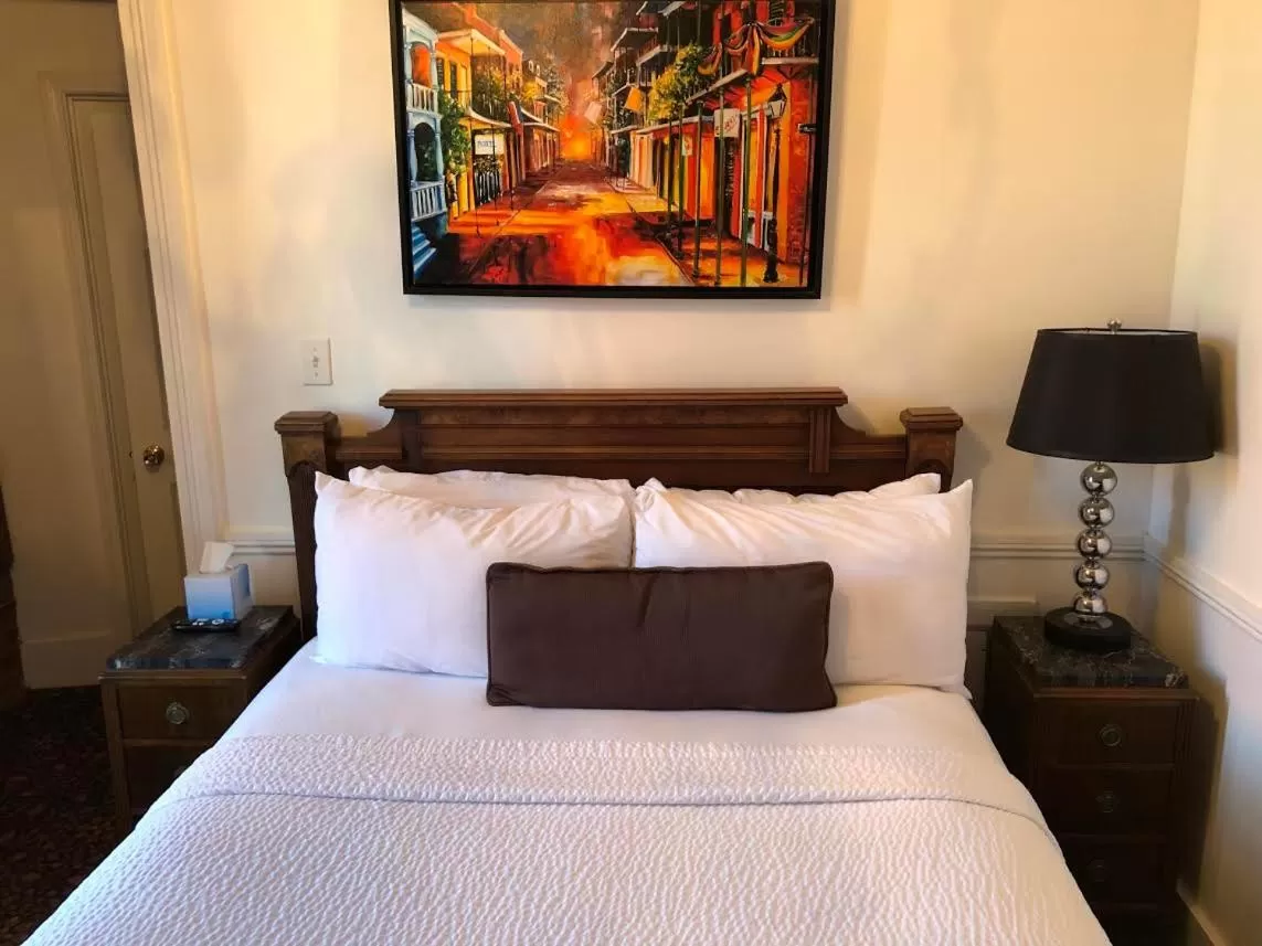 Bed in Lafitte Hotel & Bar