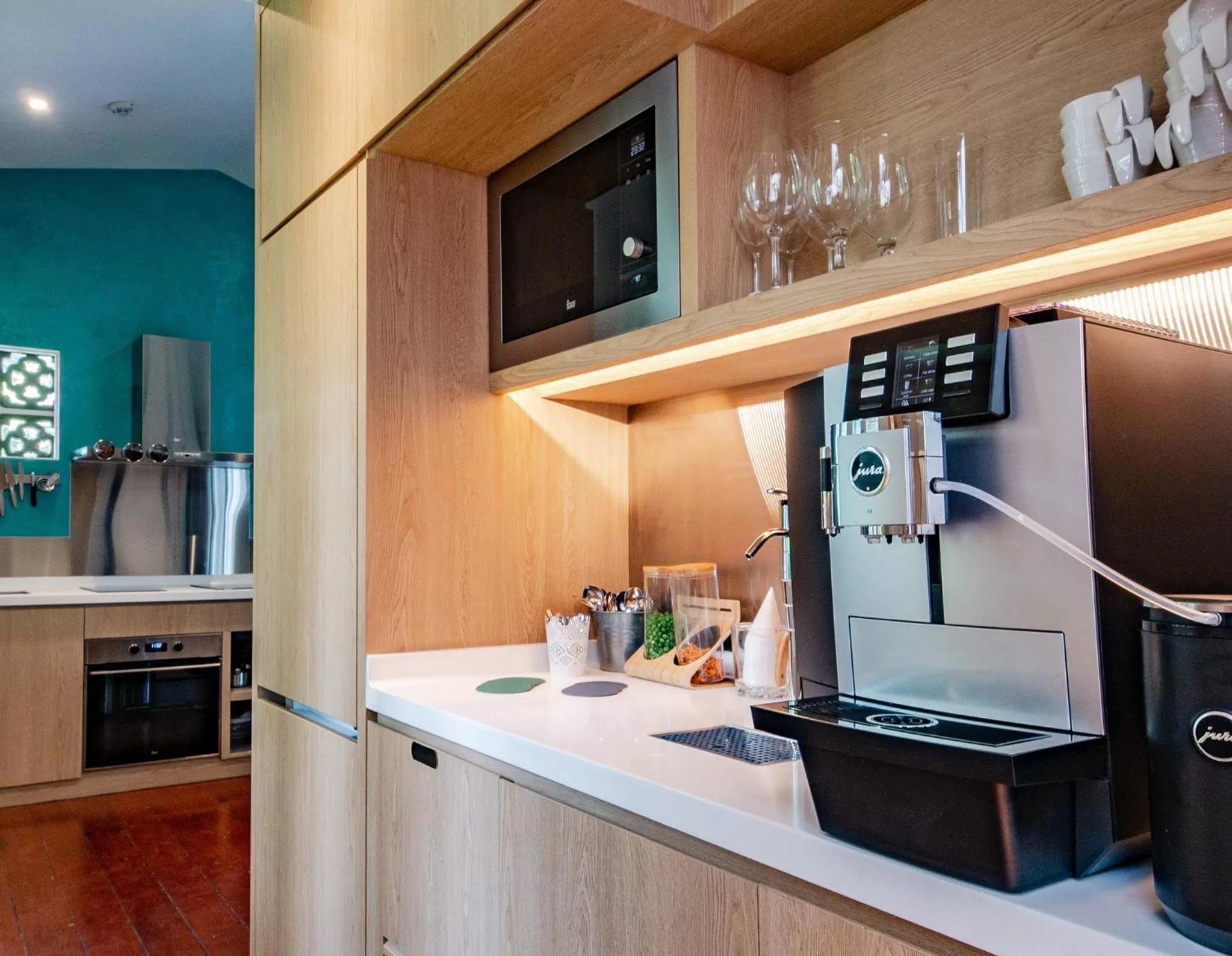 Communal kitchen in KēSa House, The Unlimited Collection managed by The Ascott Limited