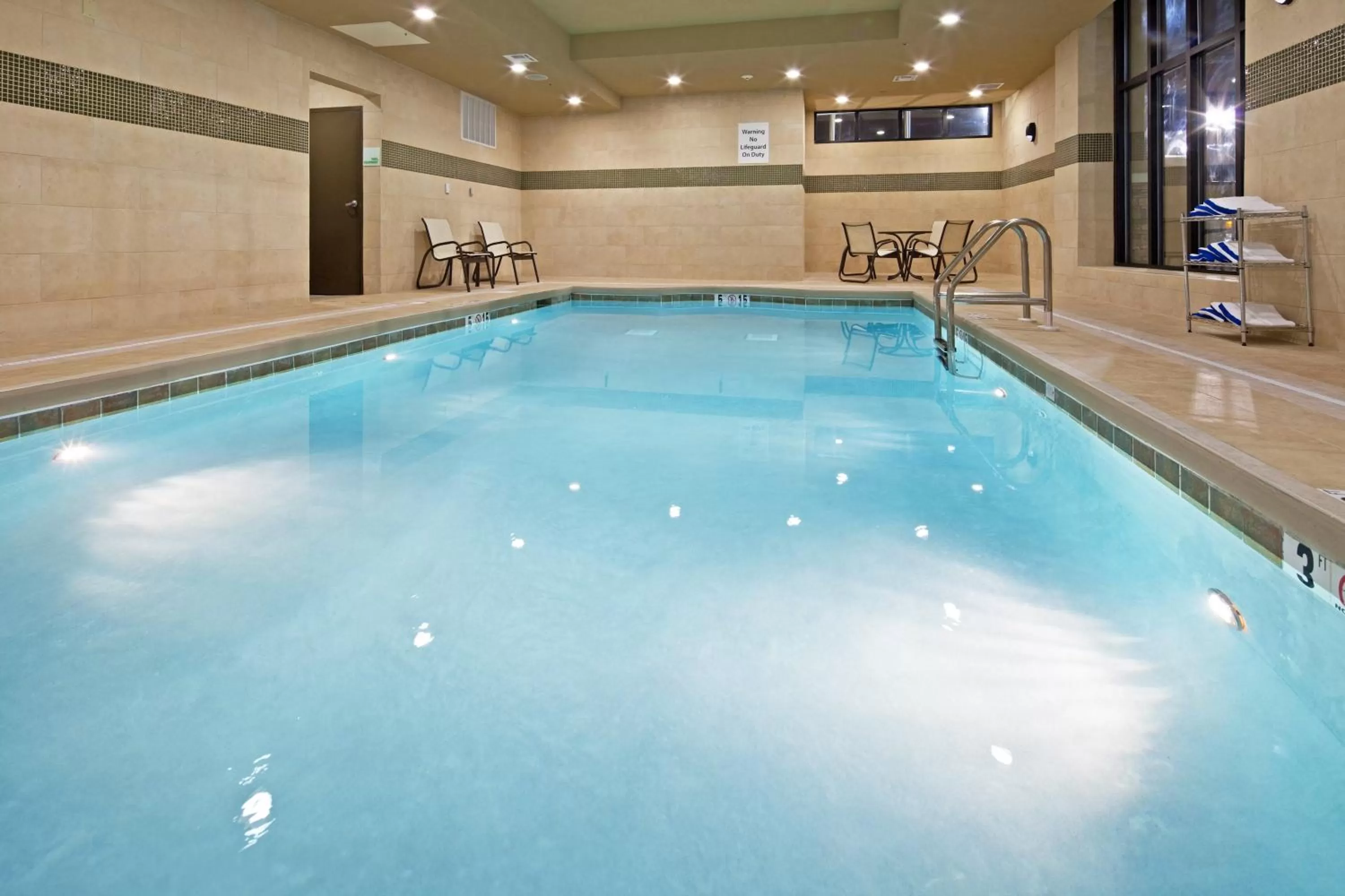 Swimming pool in Holiday Inn Mobile Airport by IHG