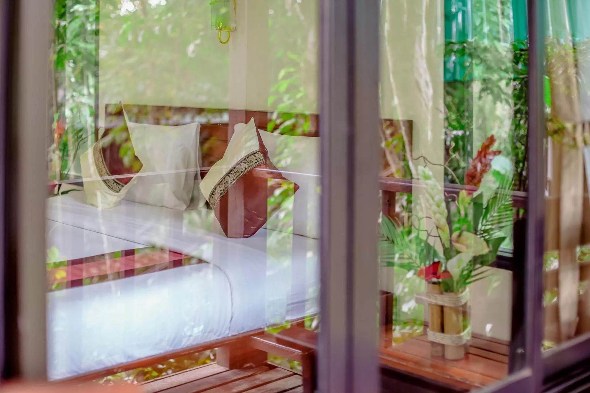 Bed in The Vatika Resort and Spa