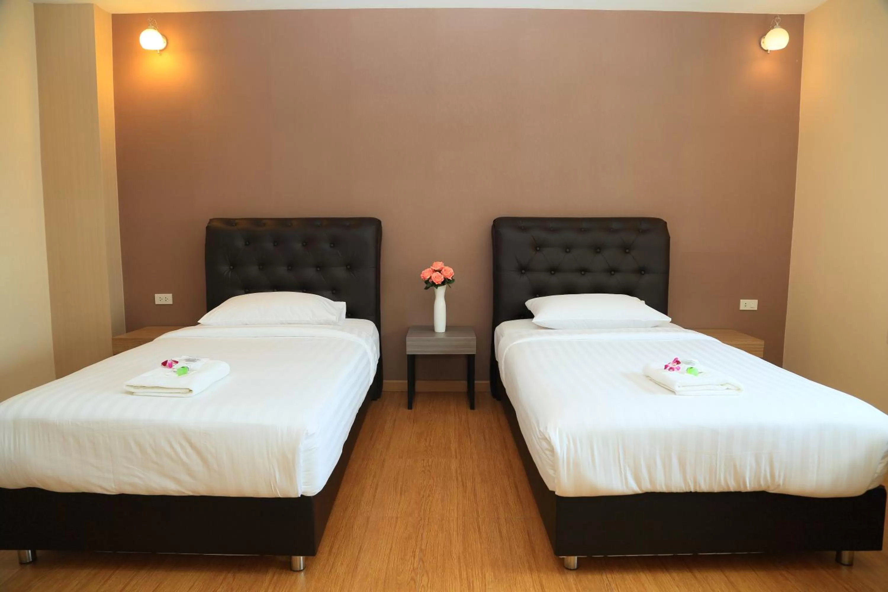 Staff, Bed in Triple Trees Hotel