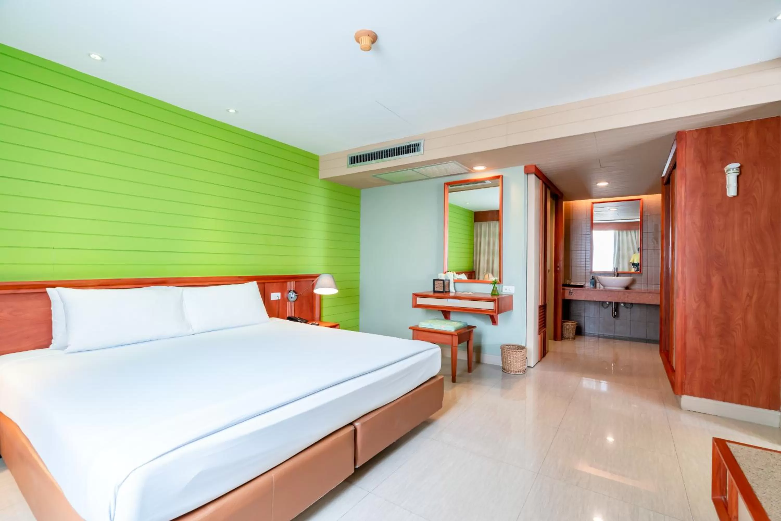 Bed in Long Beach Cha-Am Hotel