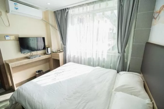Bed in Shenzhen Hualian Boutique Hotel