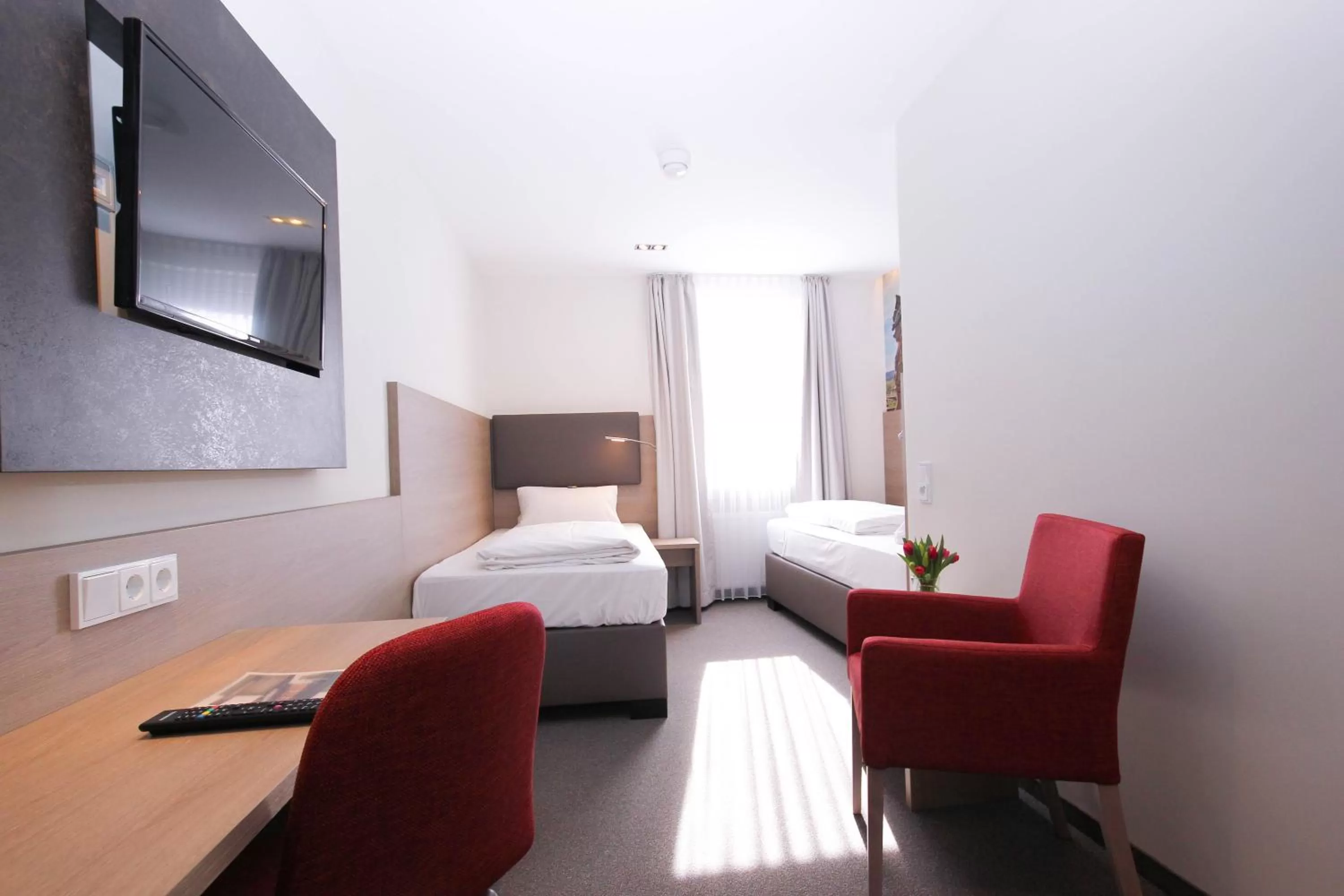 Bed in City Hotel Würzburg