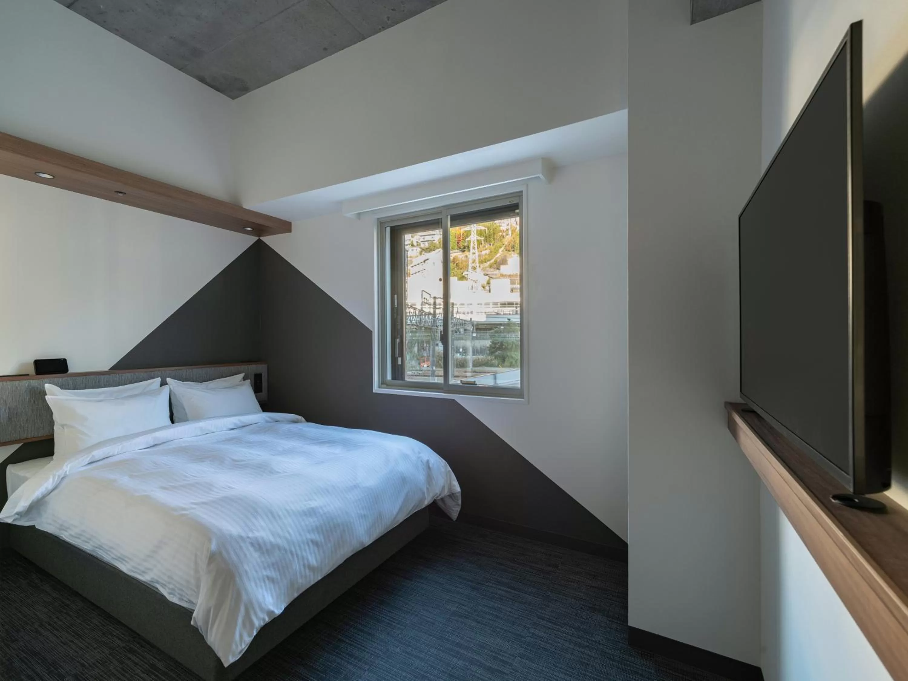 Bed in Prince Smart Inn Atami