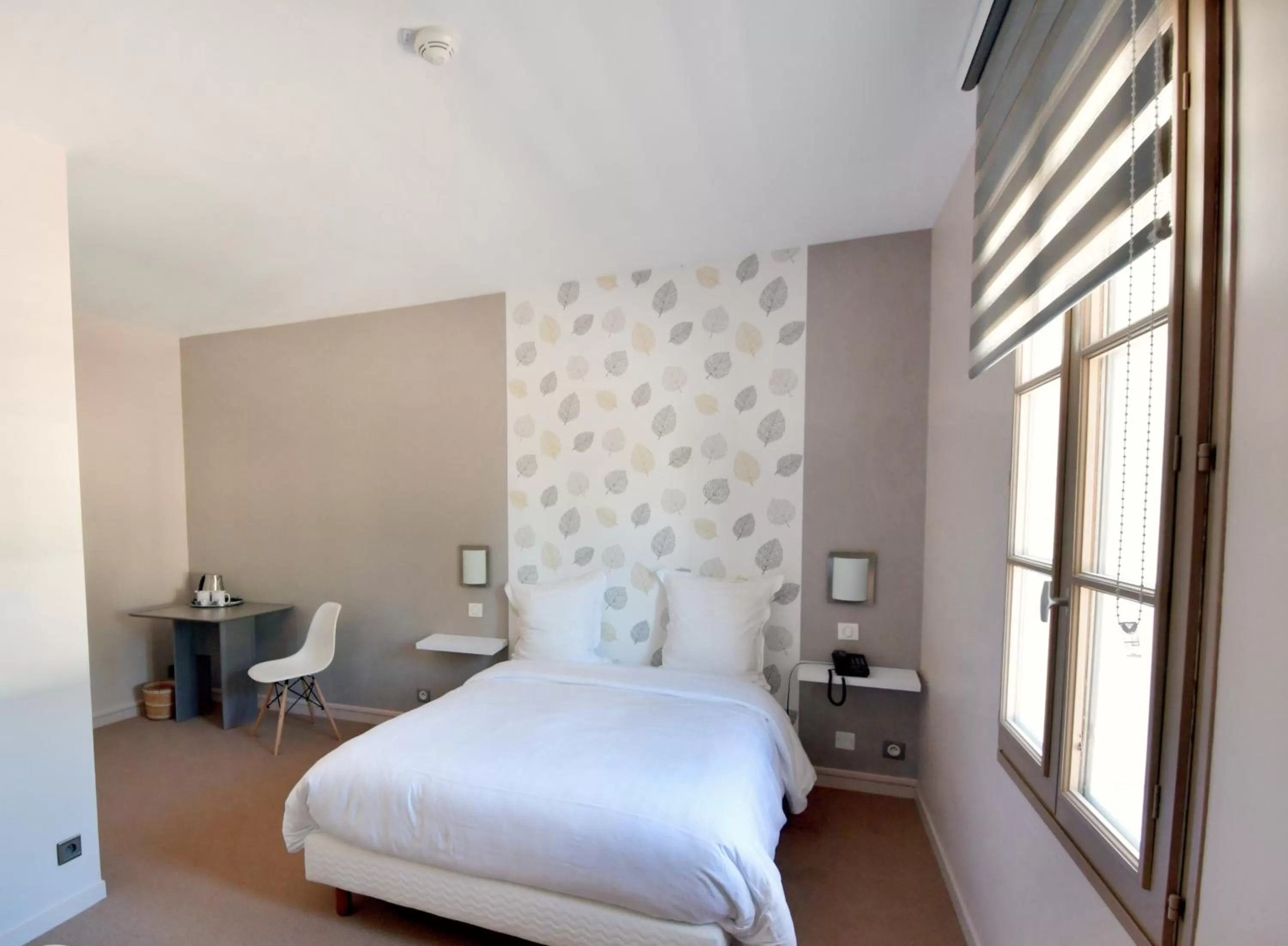 Bedroom, Bed in Logis Hotels - Château Saint Marcel