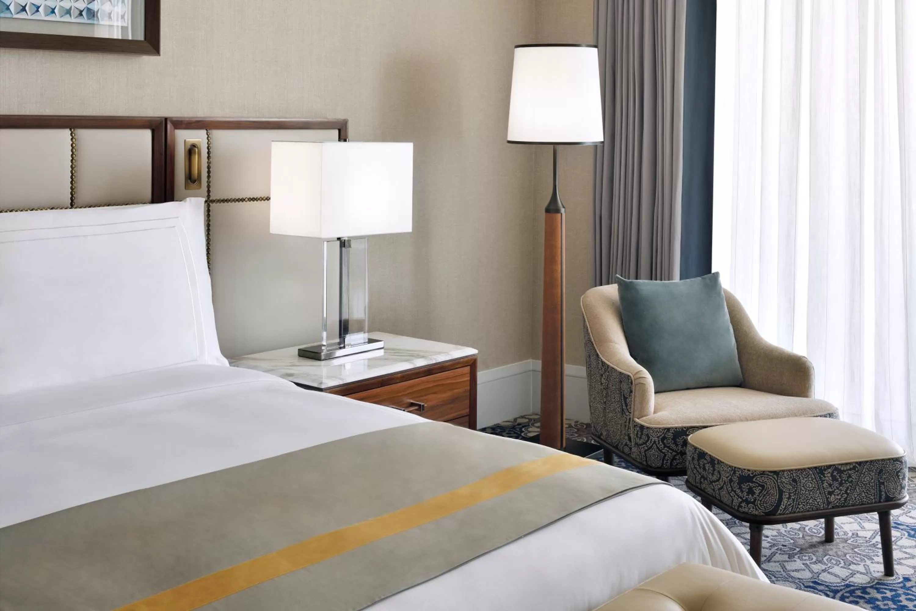 Seating area, Bed in Grand Plaza Mövenpick Media City