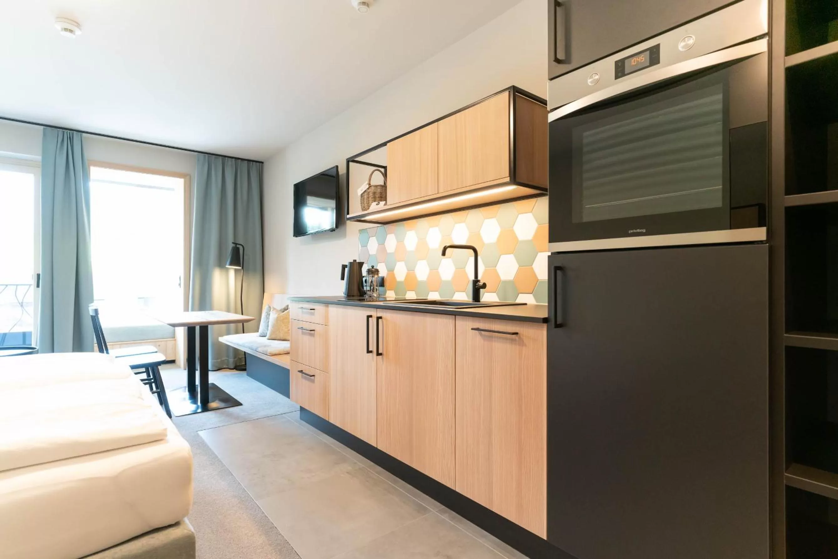 Kitchen/Kitchenette in Apart & Suiten Hotel WEIDEN