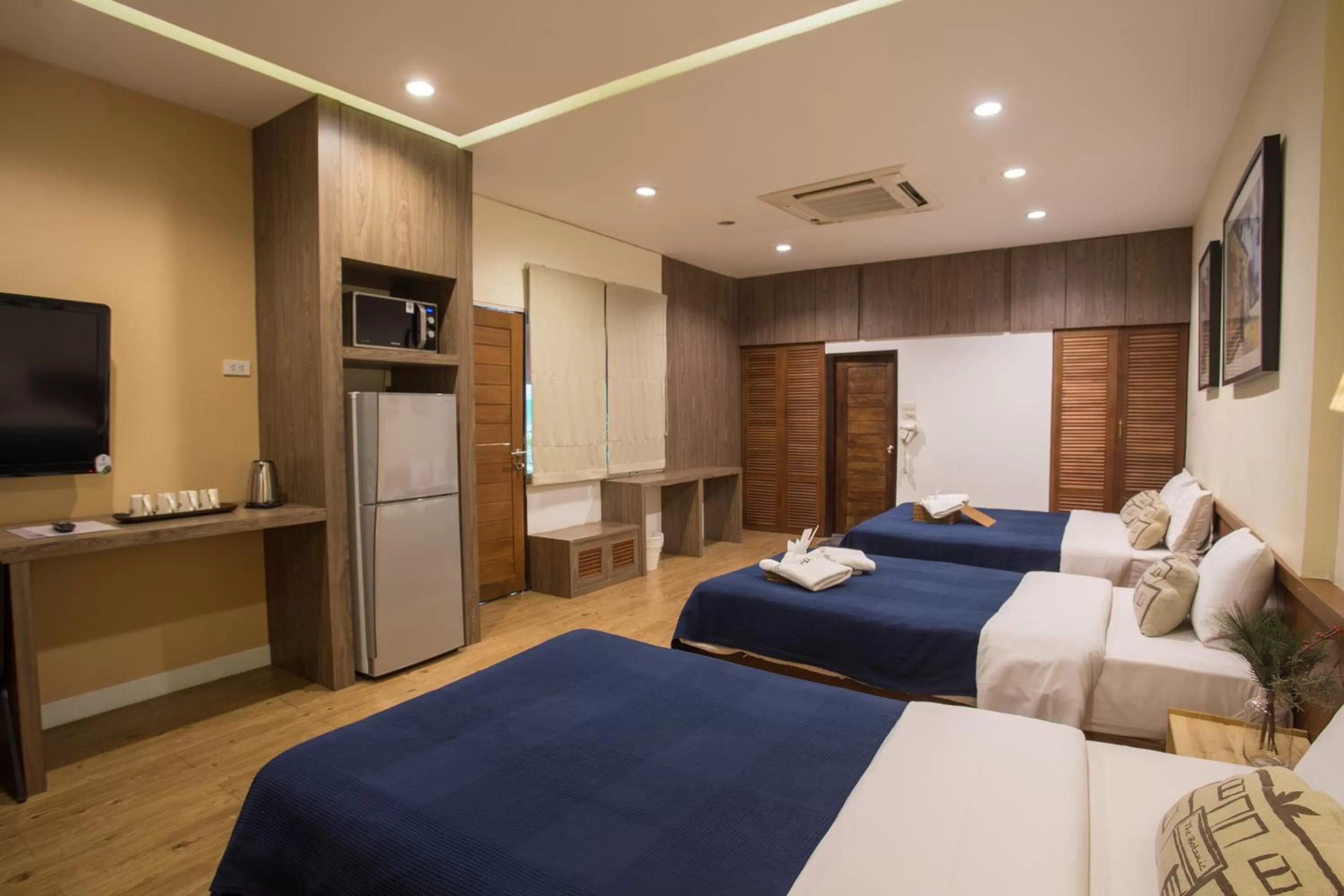 Bed in Botanic Service Room at Impact Muangthongthani - SHA Certified