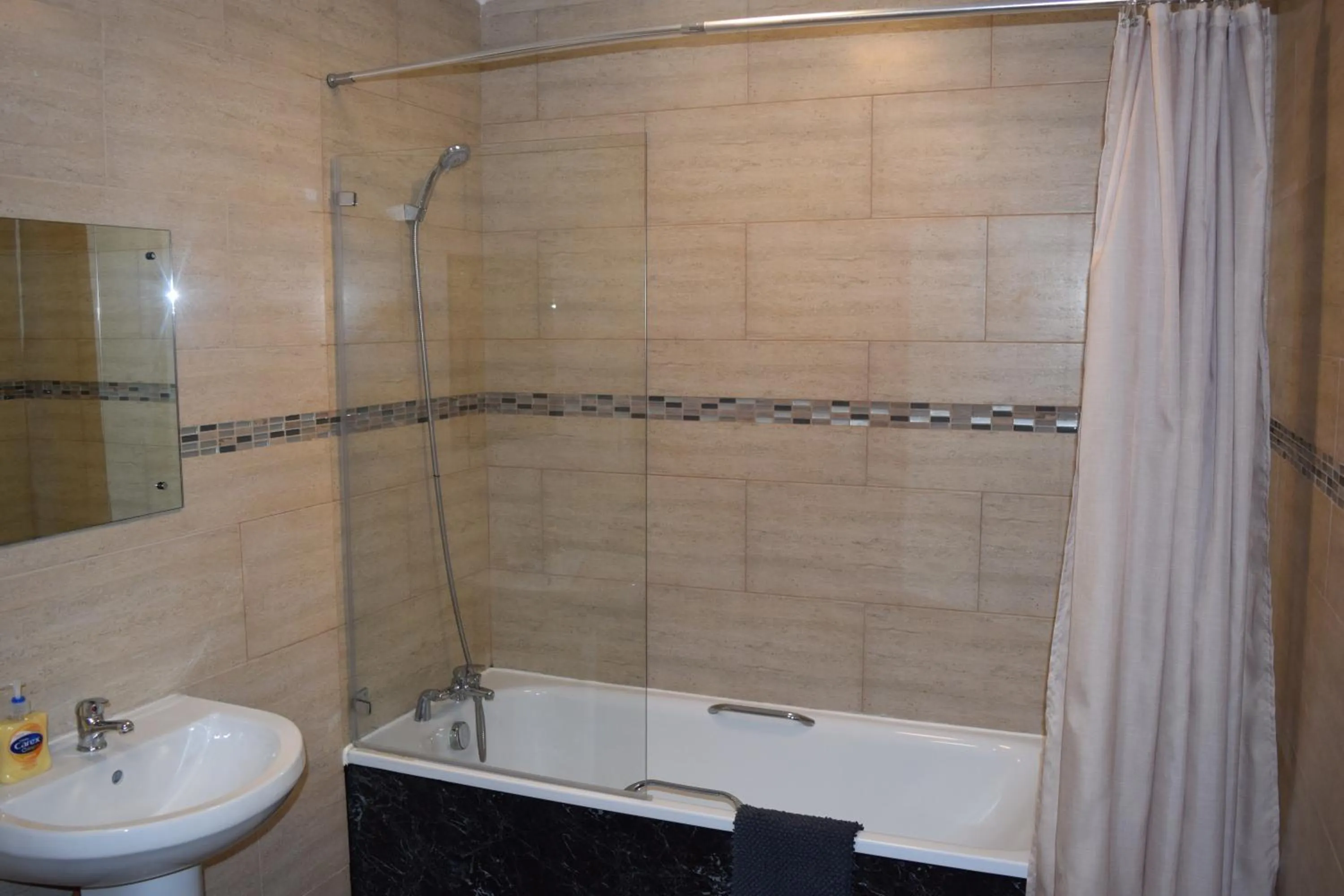Bathroom in Star Anglia Hotel City Center by OYO