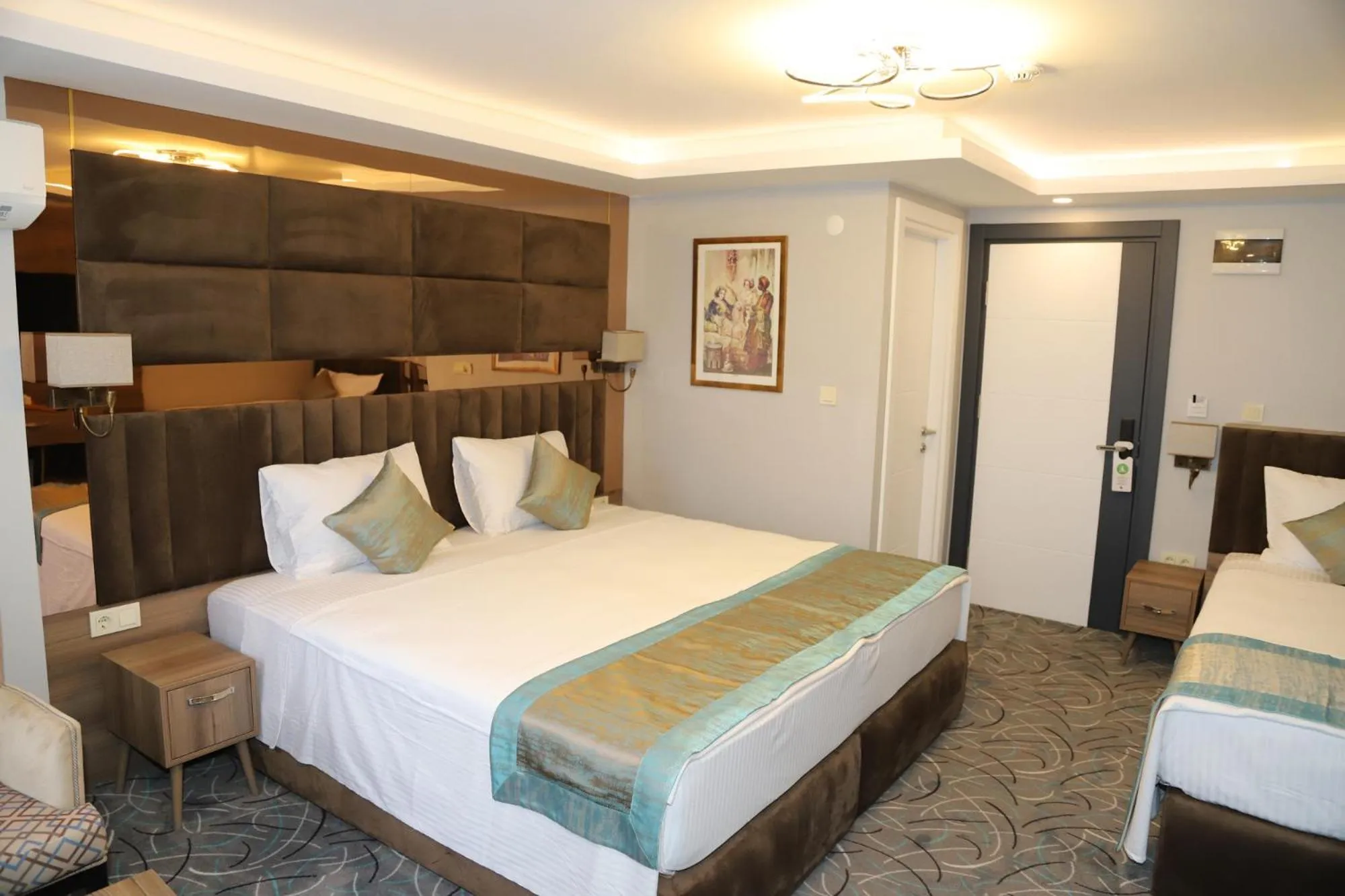 Bed in Grand Kavi Hotel