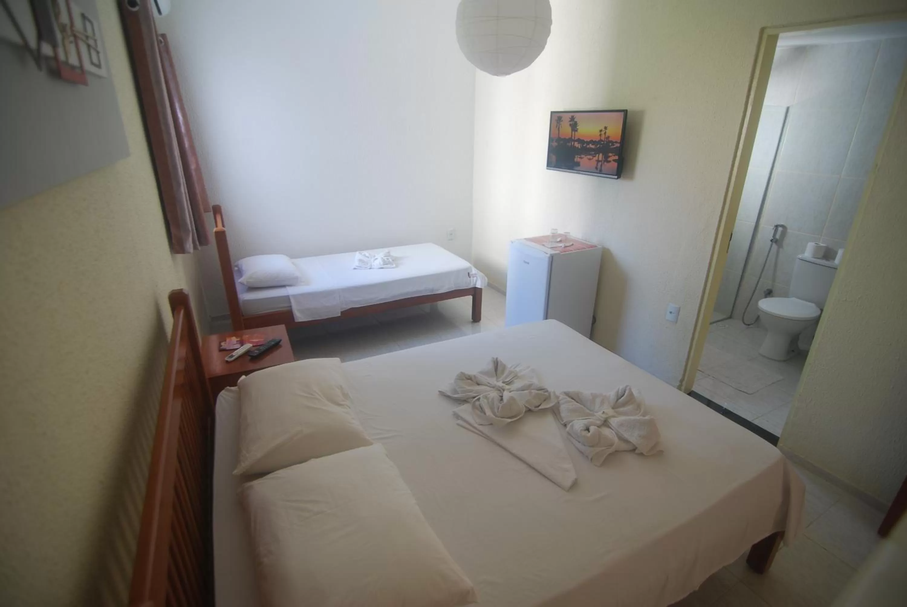 Bed in Refúgio Pousada Fortaleza