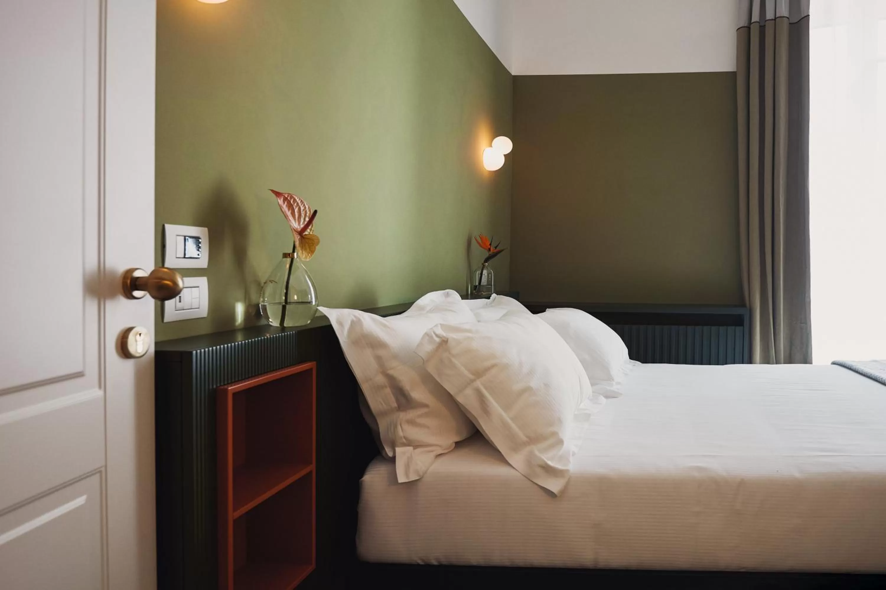 Bed in Volante Urban Design Hotel