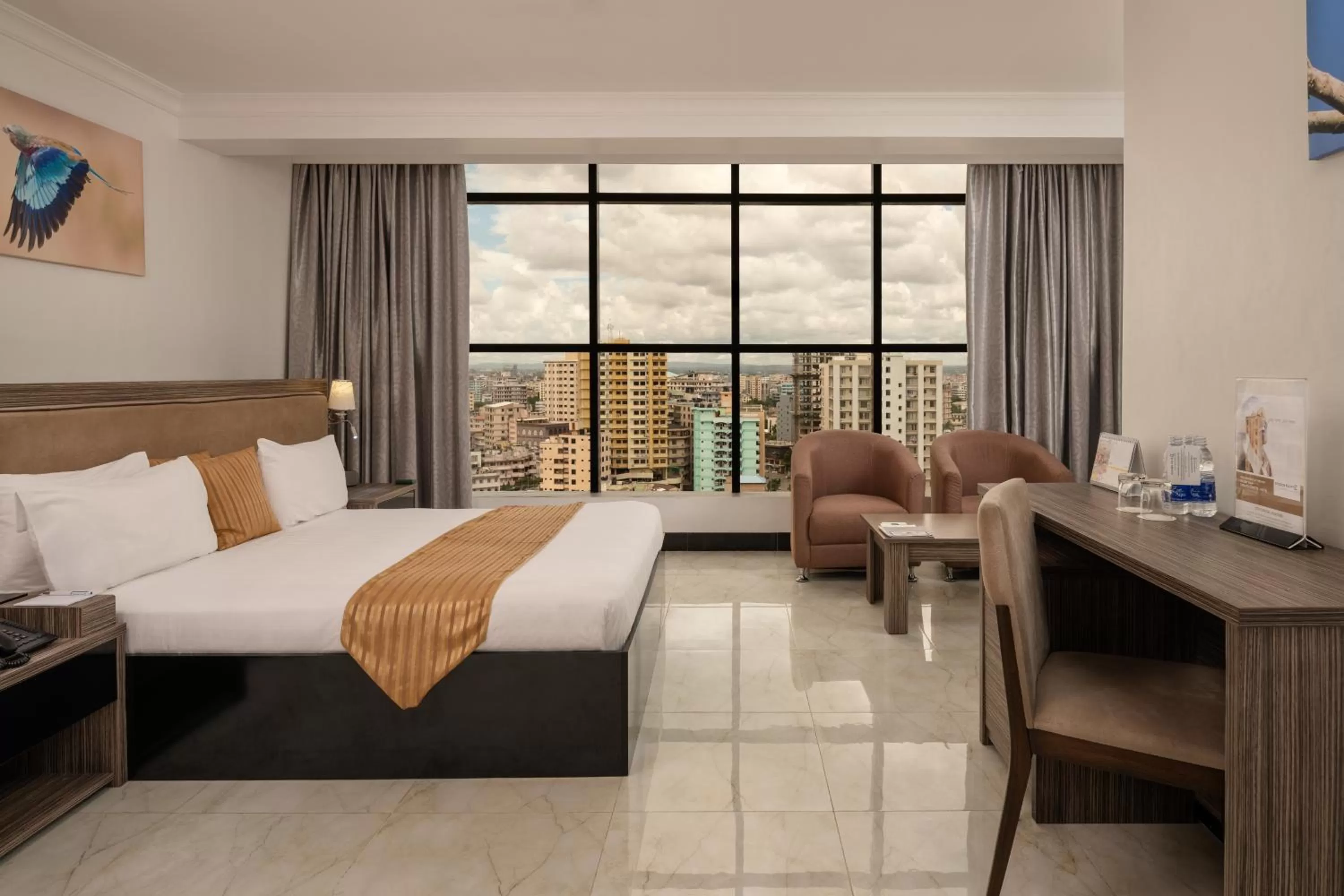 Photo of the whole room, Bed in Golden Tulip Dar Es Salaam City Center Hotel