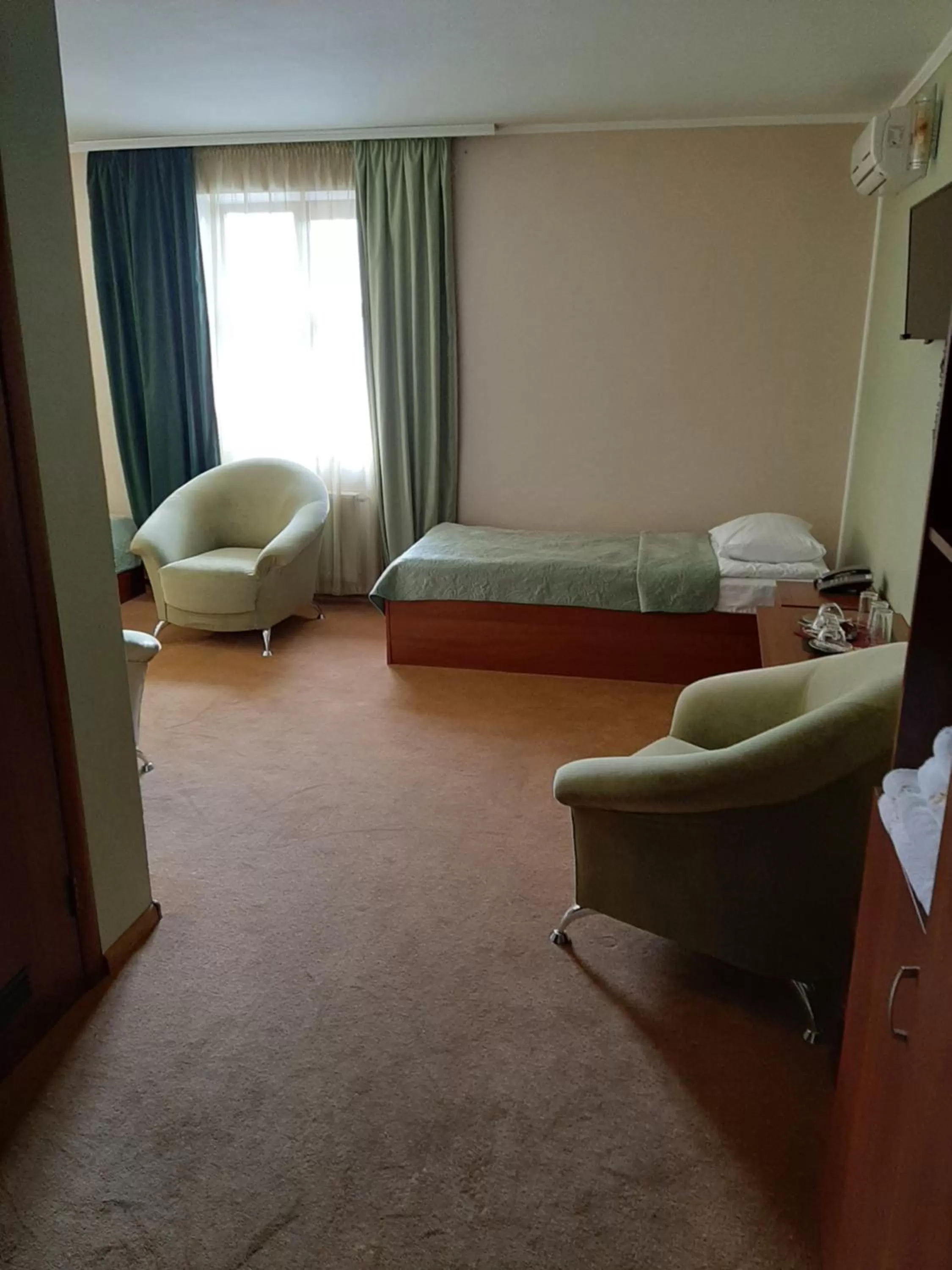 Bed, Seating Area in Stara Vezha Hotel