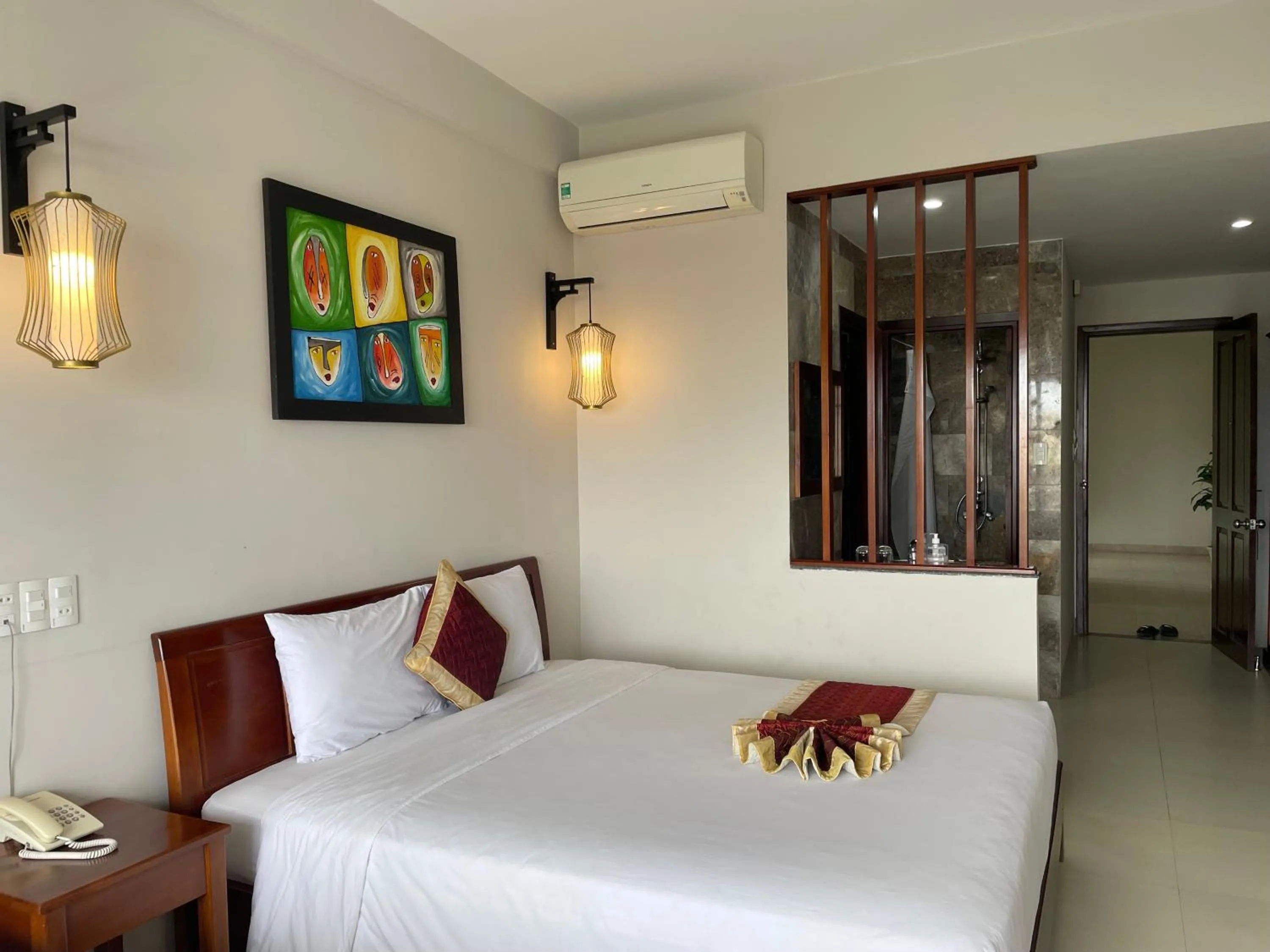 Bed in Sunshine Hoian Hotel