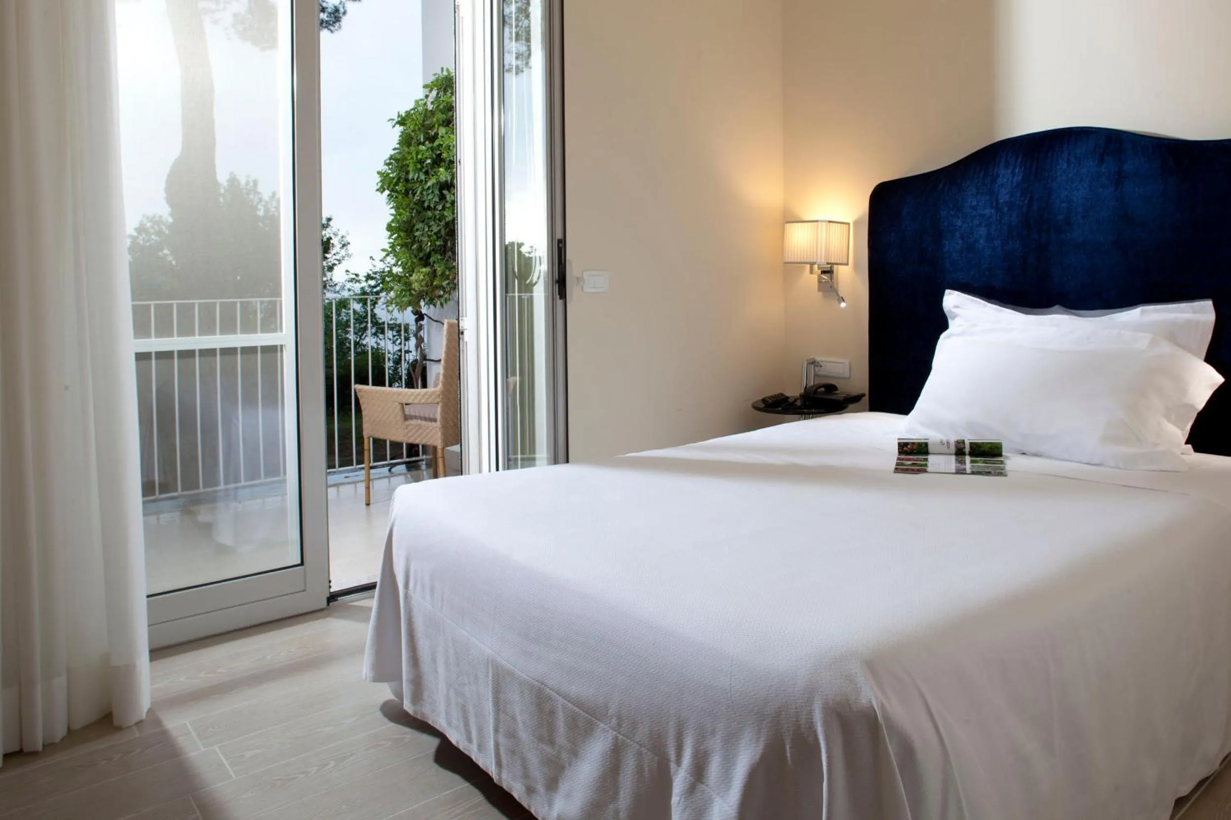 Bed in Hotel Riviera & Maximilian's