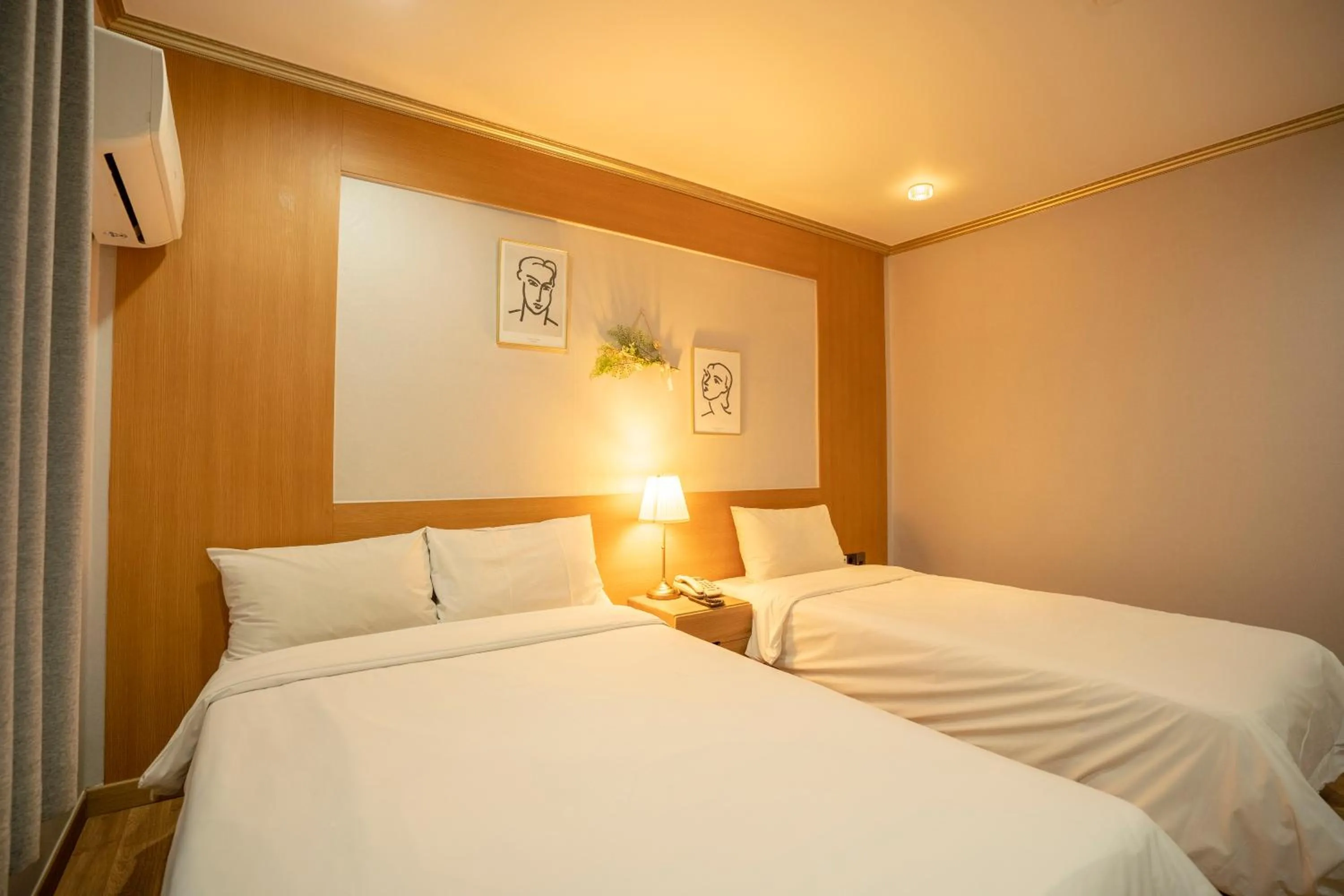 Bed in Jeju Stay Hotel