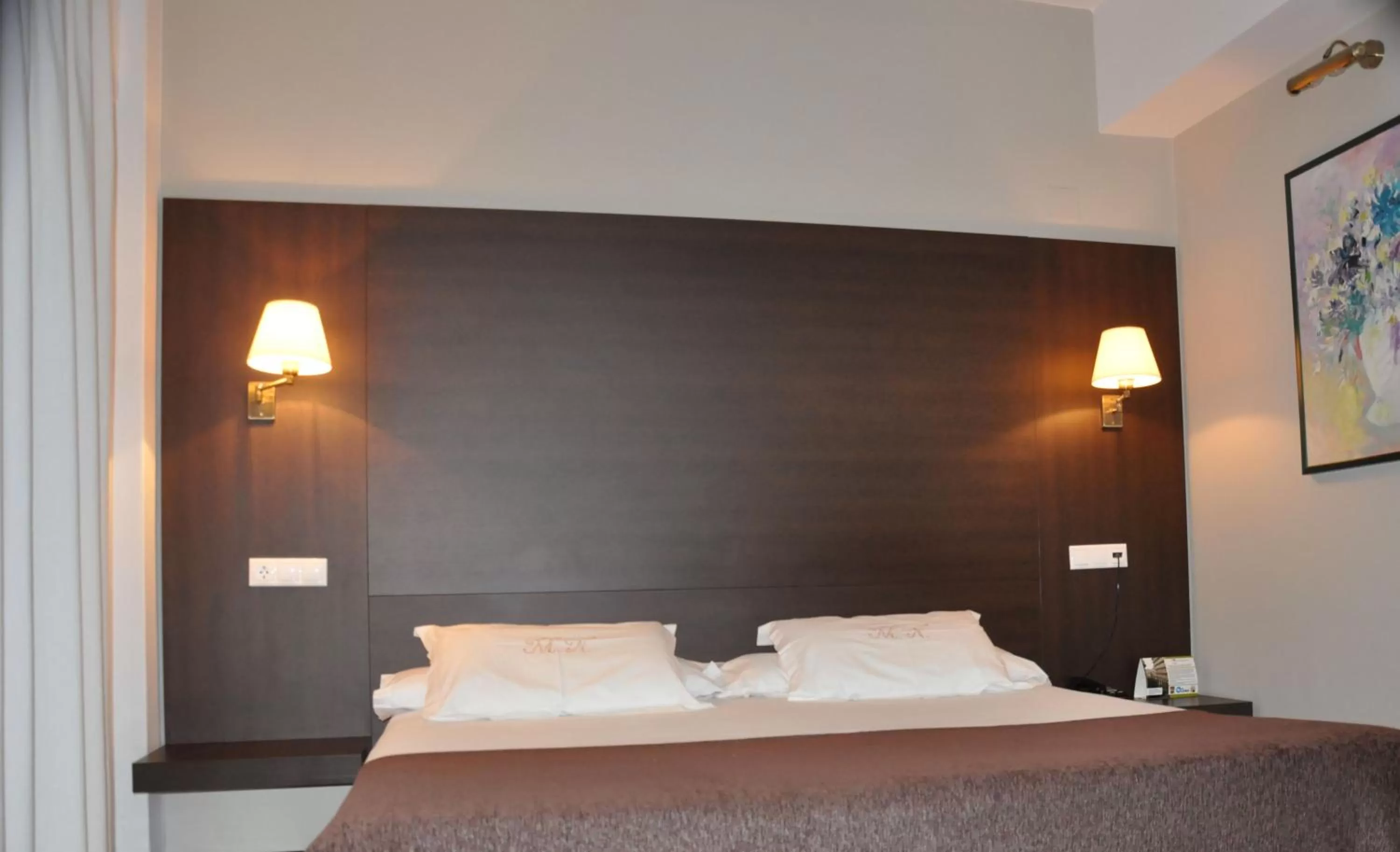 Bed in Hotel Mendez Nuñez