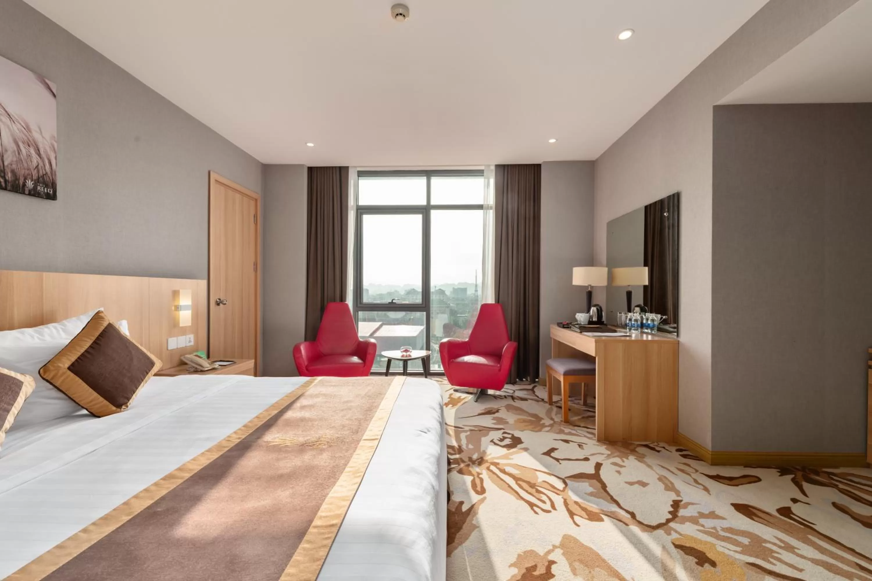 Bed in The Reed Hotel