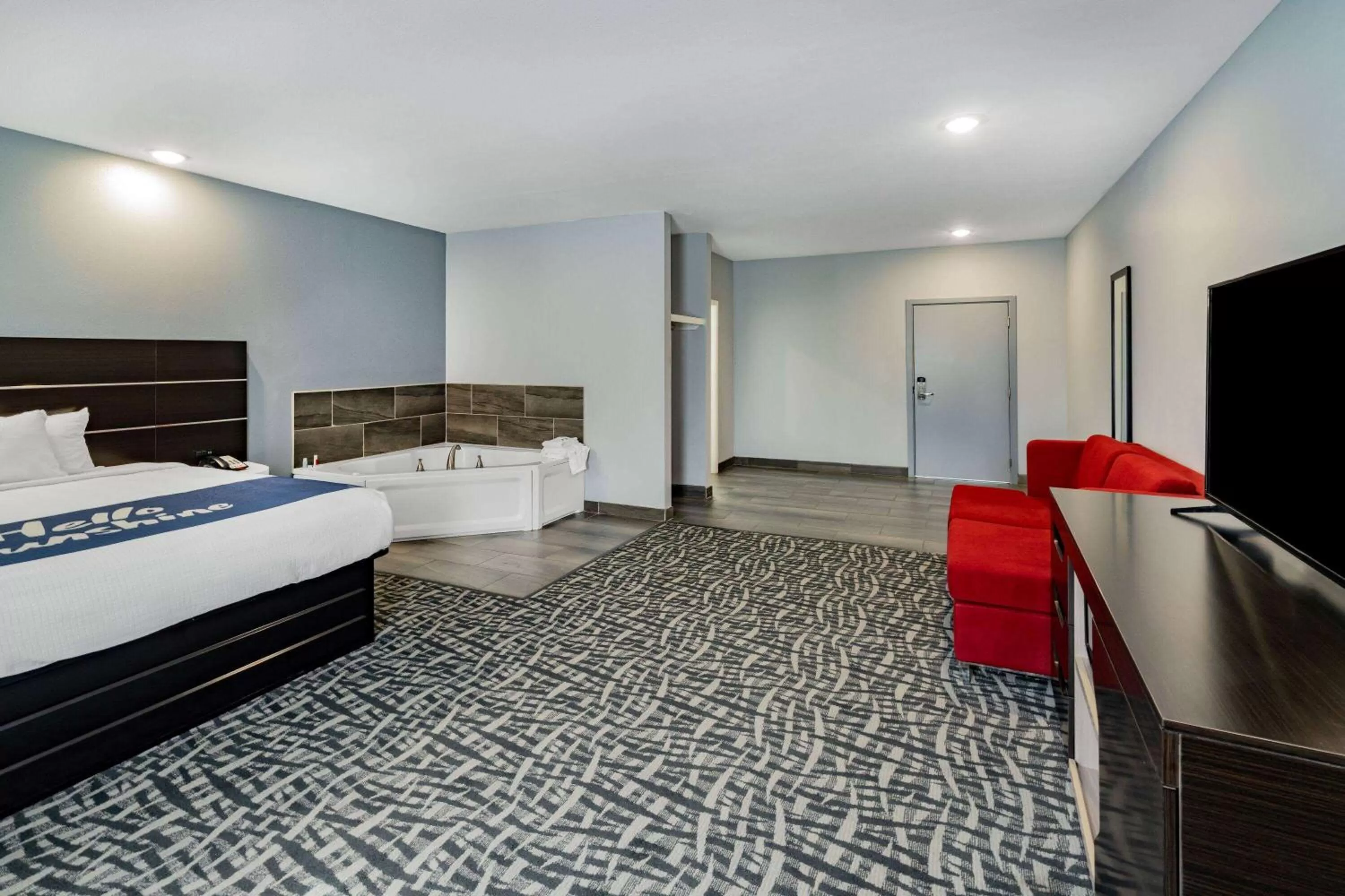 Photo of the whole room, Bed in Days Inn & Suites by Wyndham Horn Lake - Memphis Graceland
