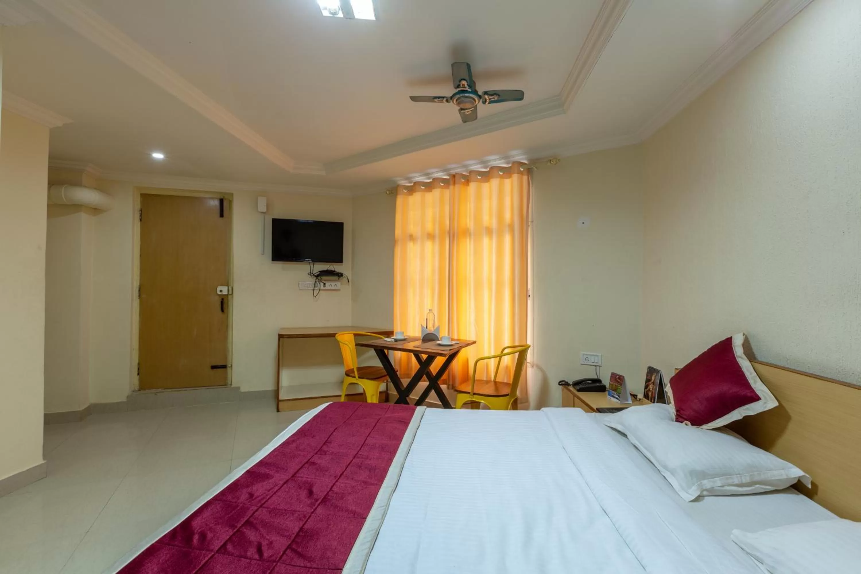 Bed in KSTDC Hotel Mayura Nisarga Pearl Valley