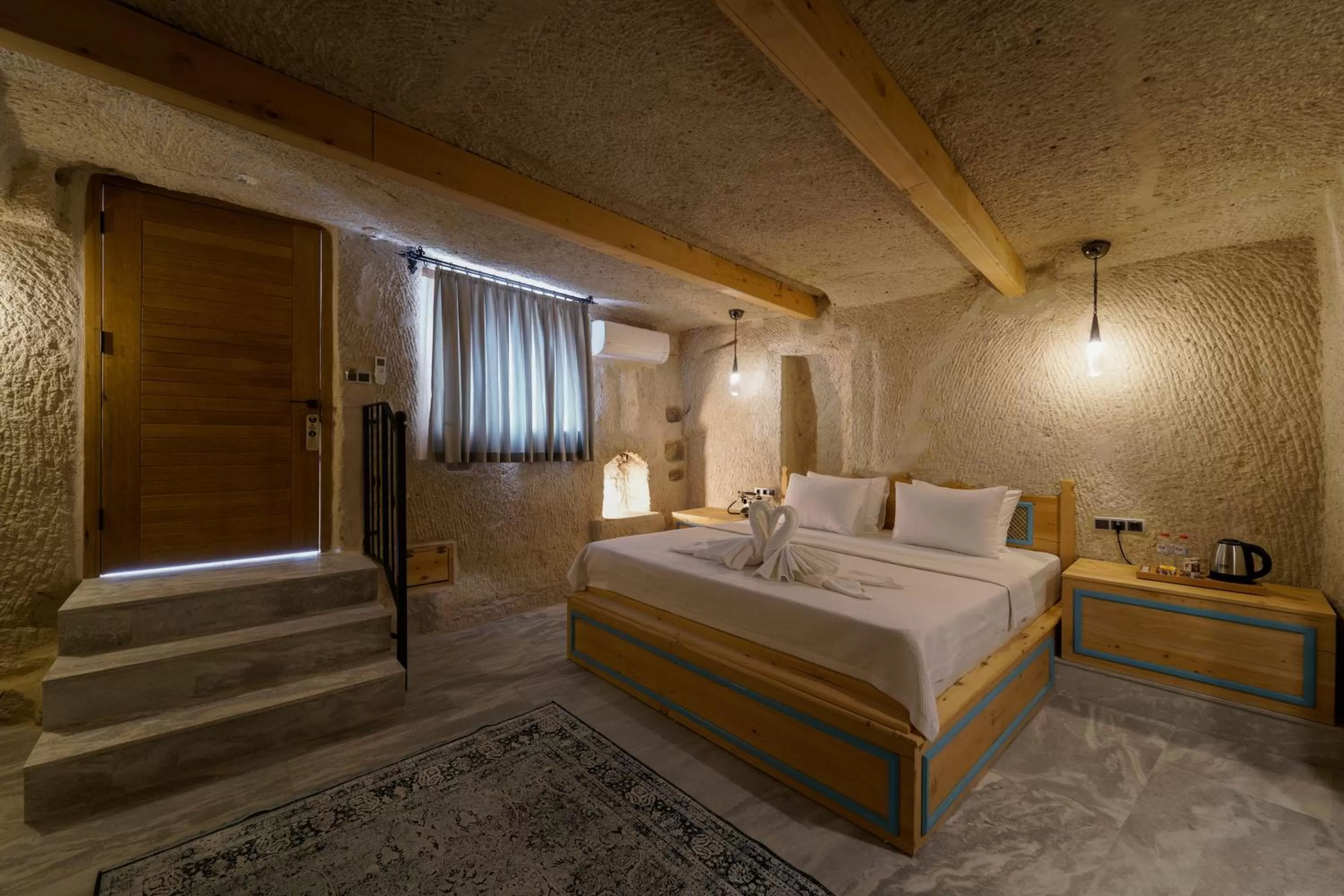 Bed in The Niche Cave Hotel