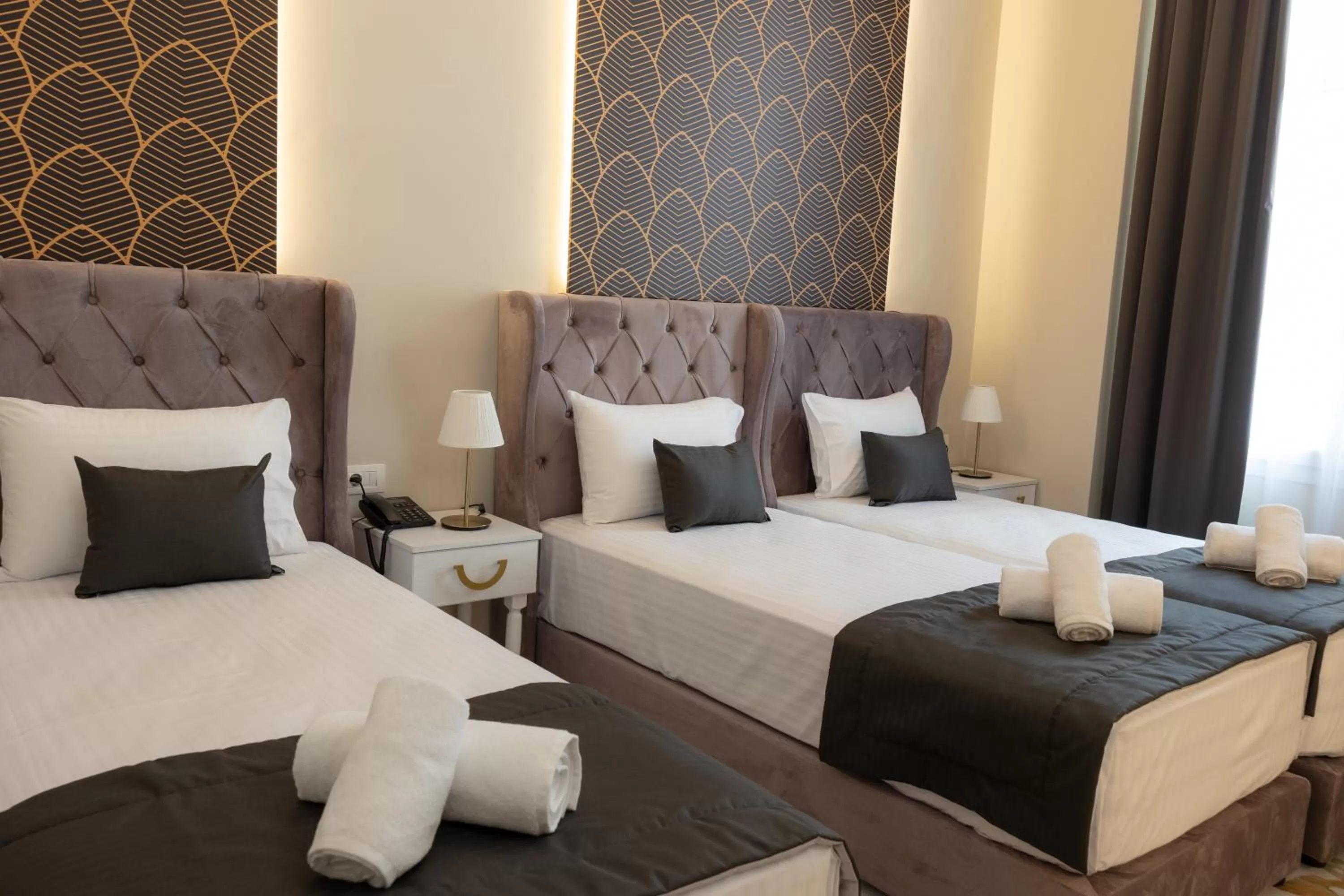 Bed in Modern Revival Luxury Hotel