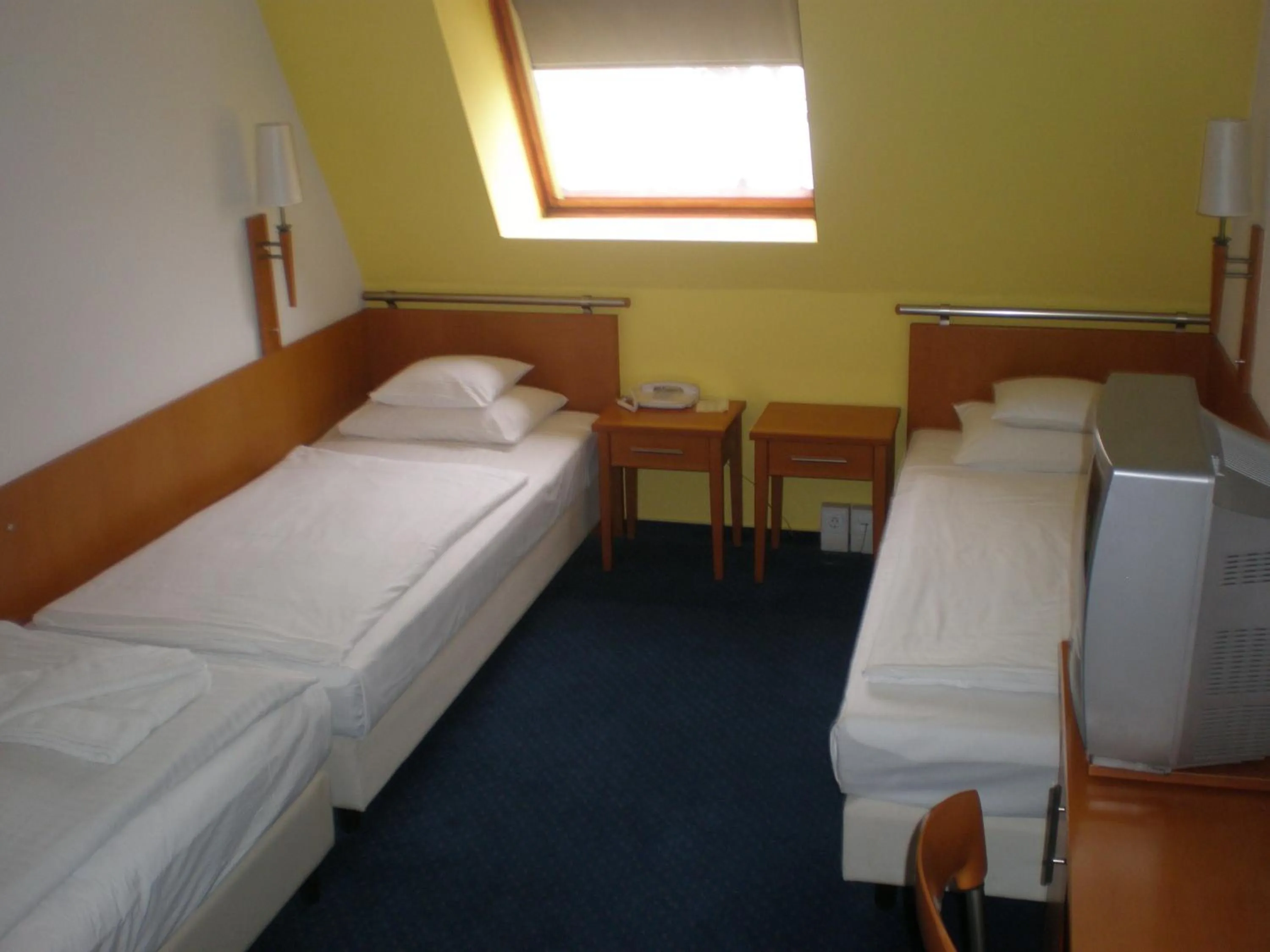 Bed in Hotel Veritas