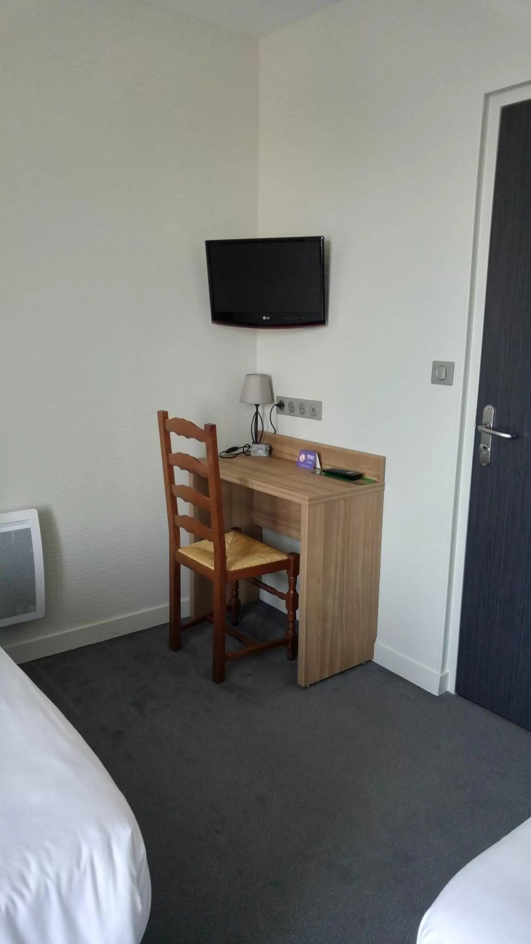 Photo of the whole room, Bed in Hôtel Le Verger