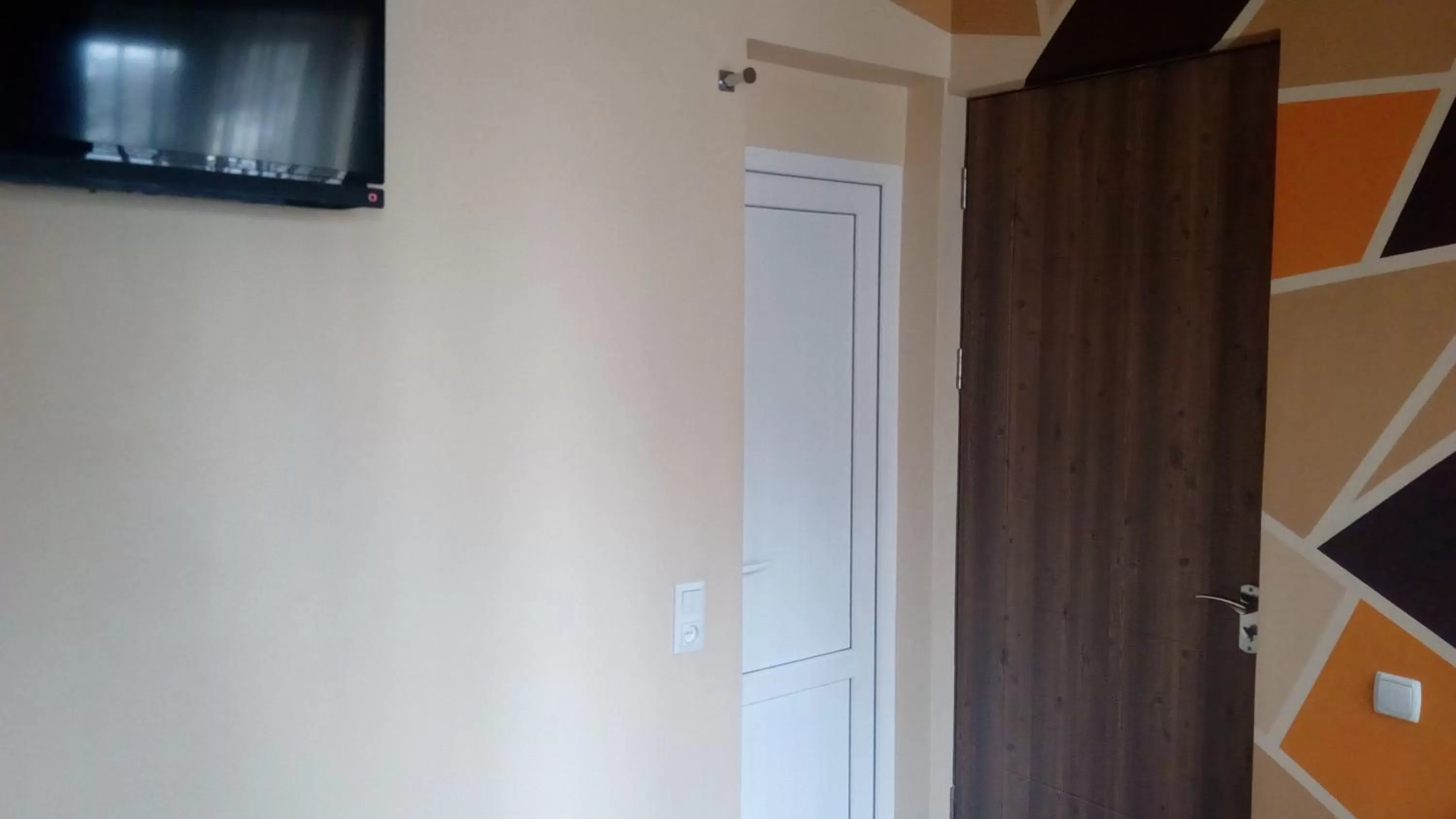 TV and multimedia, TV/Entertainment Center in Hotel Isani