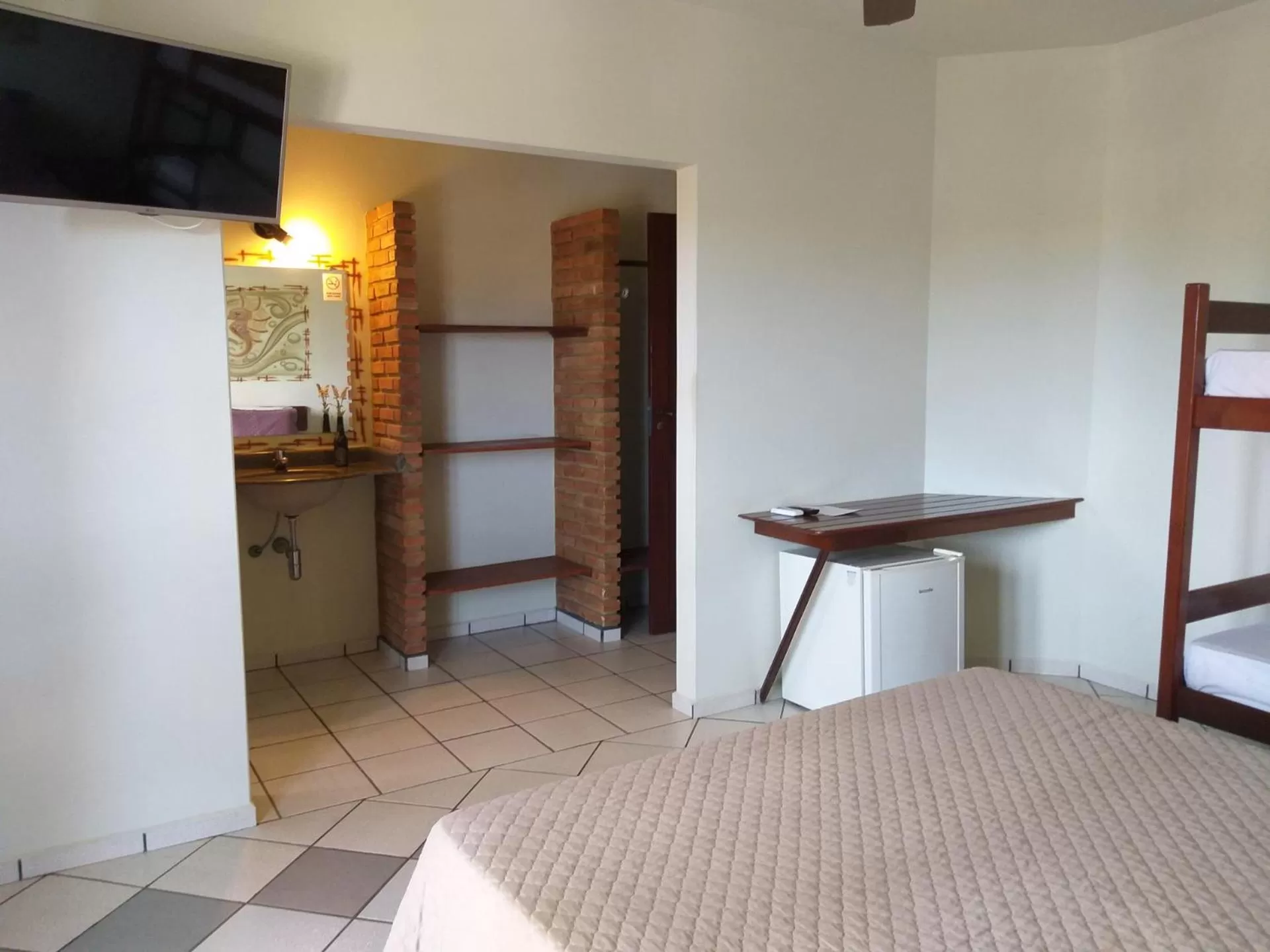 Bedroom in Pousada Coral de Fogo