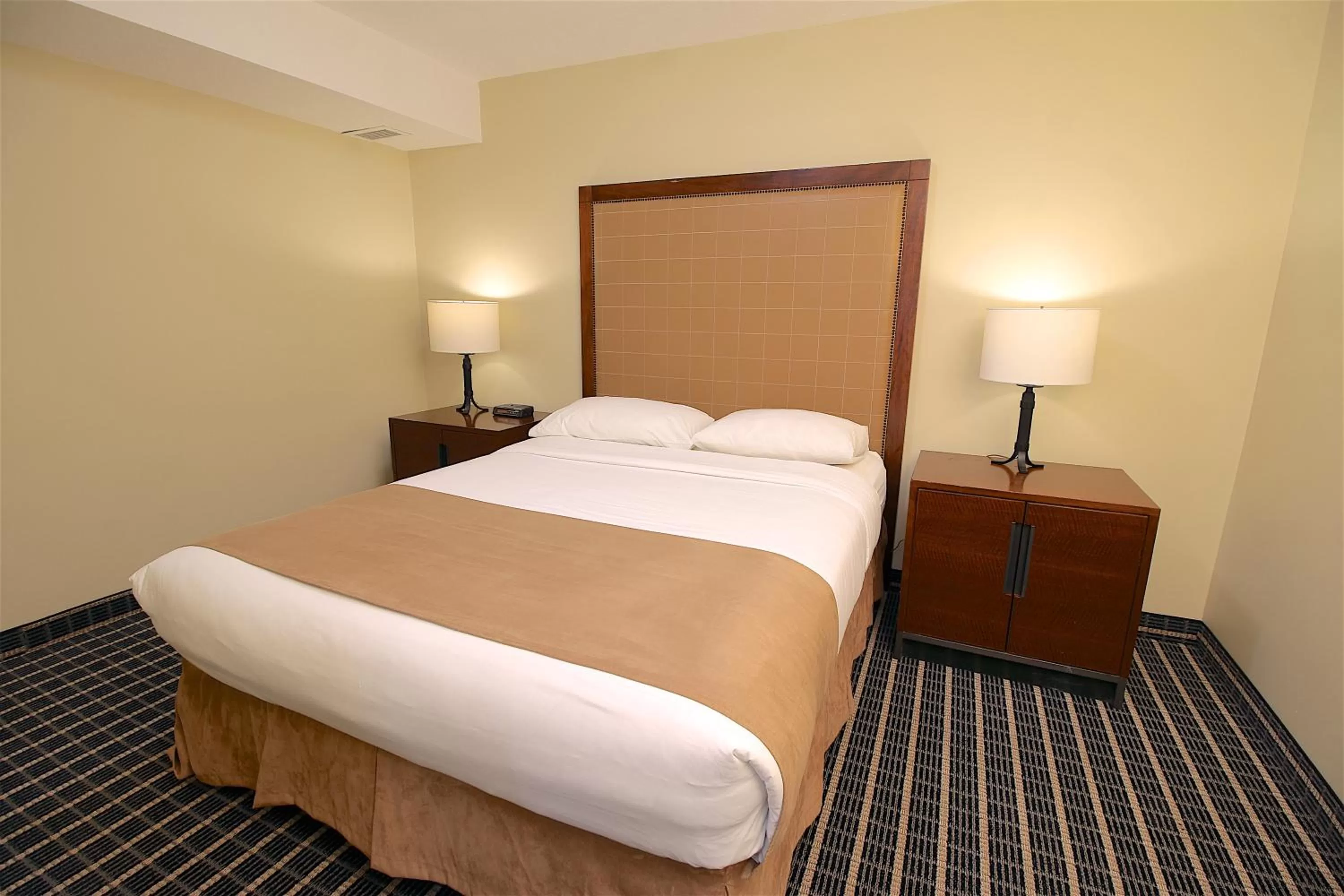 Bed in Medicine Hat Suites