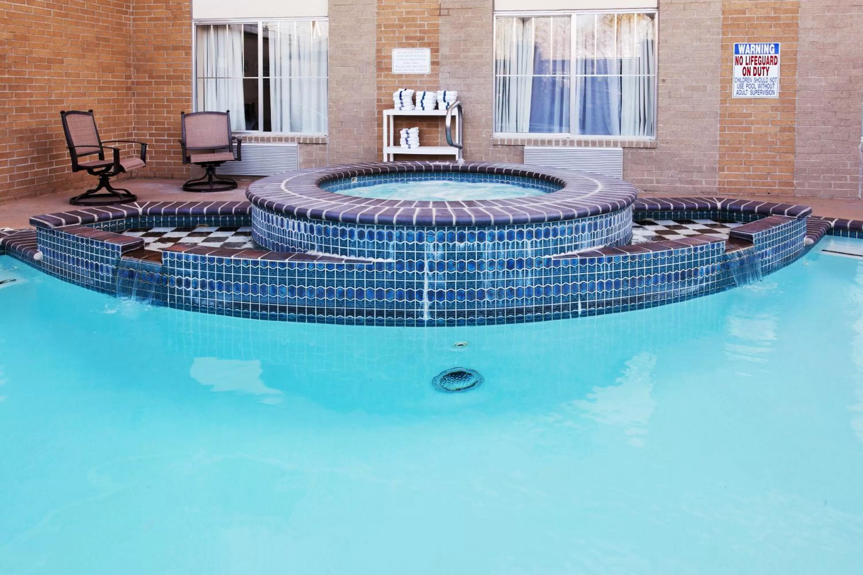 Swimming pool in Holiday Inn Express Hotel & Suites San Antonio - Rivercenter Area by IHG