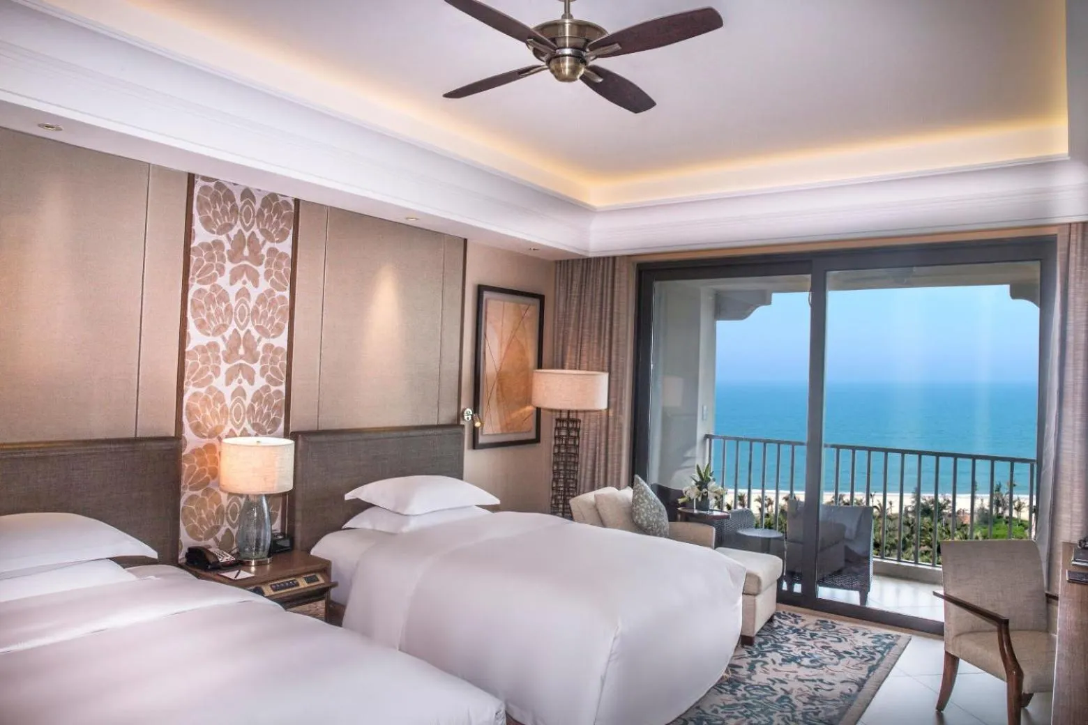 Bed in Hilton Haikou Meilan - Beachfront Hotel