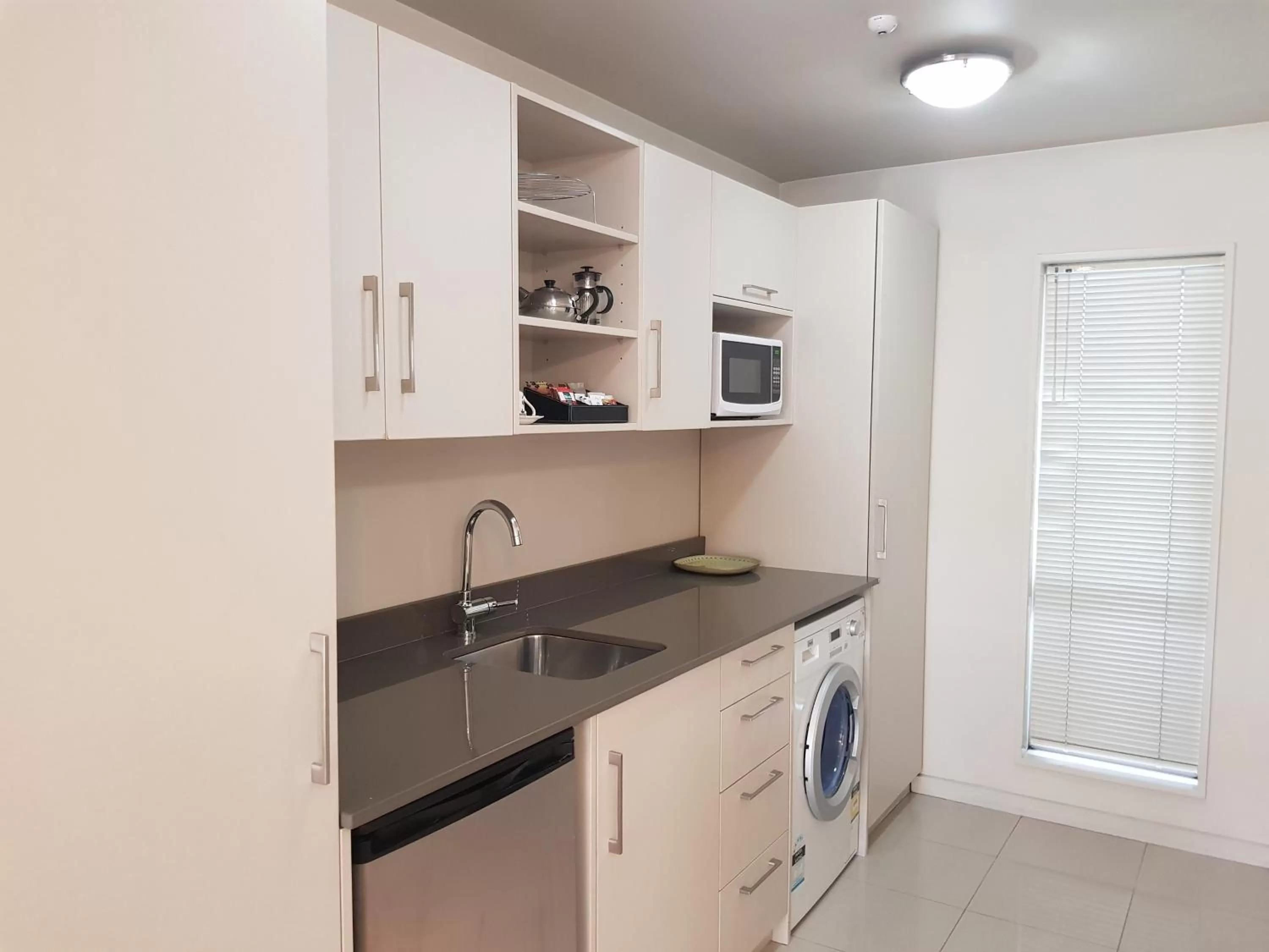 Kitchen or kitchenette in Delago Motel/Apartments