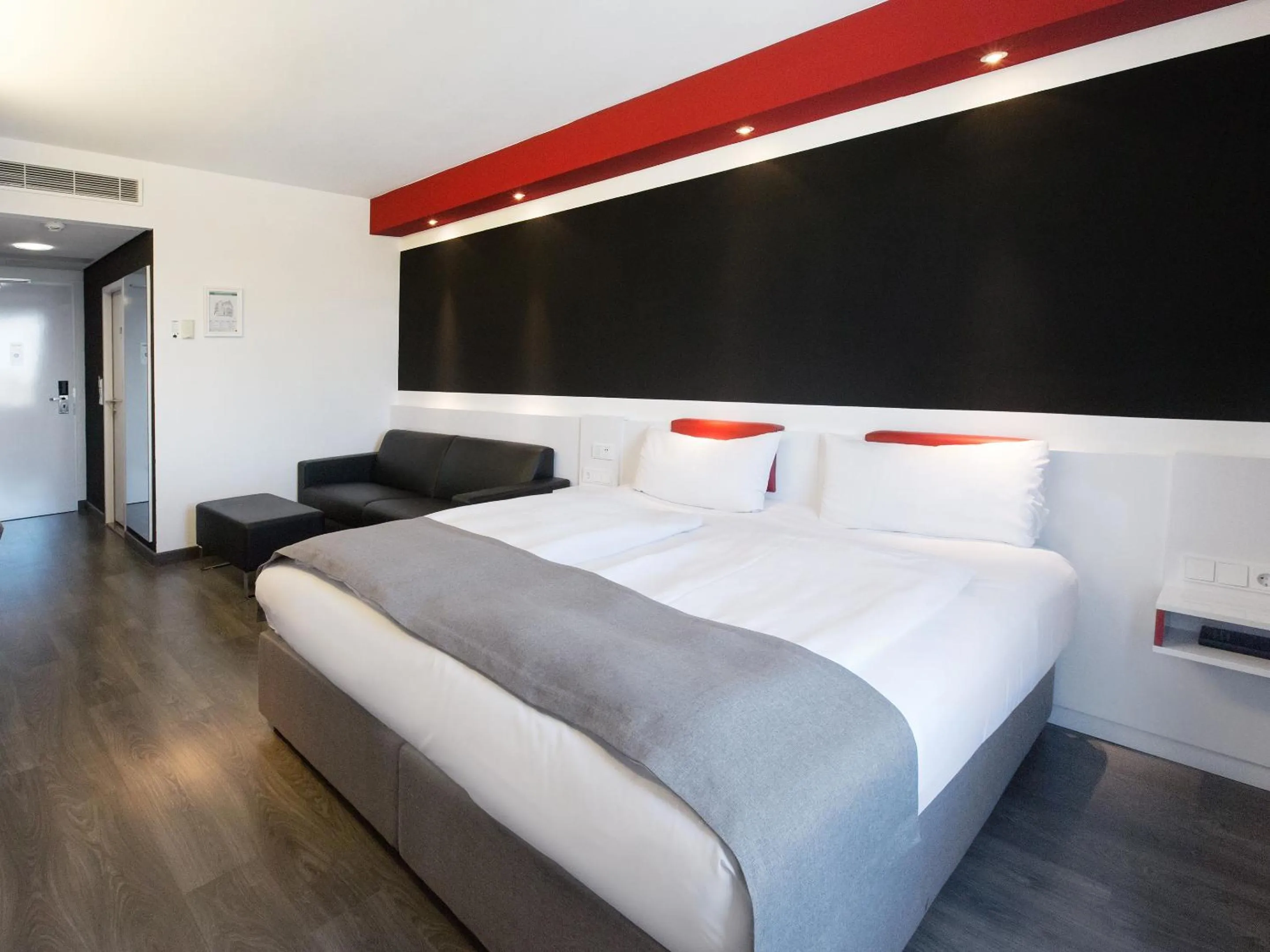 Photo of the whole room, Bed in DORMERO Hotel Stuttgart