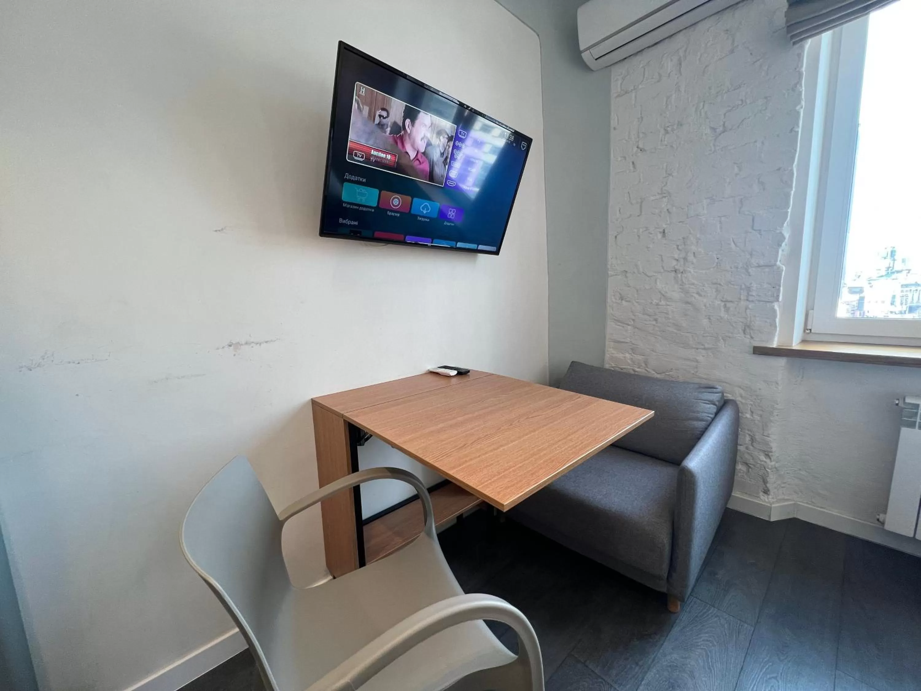 TV and multimedia, TV/Entertainment Center in Kyiv Panorama Apartments near Gulliver