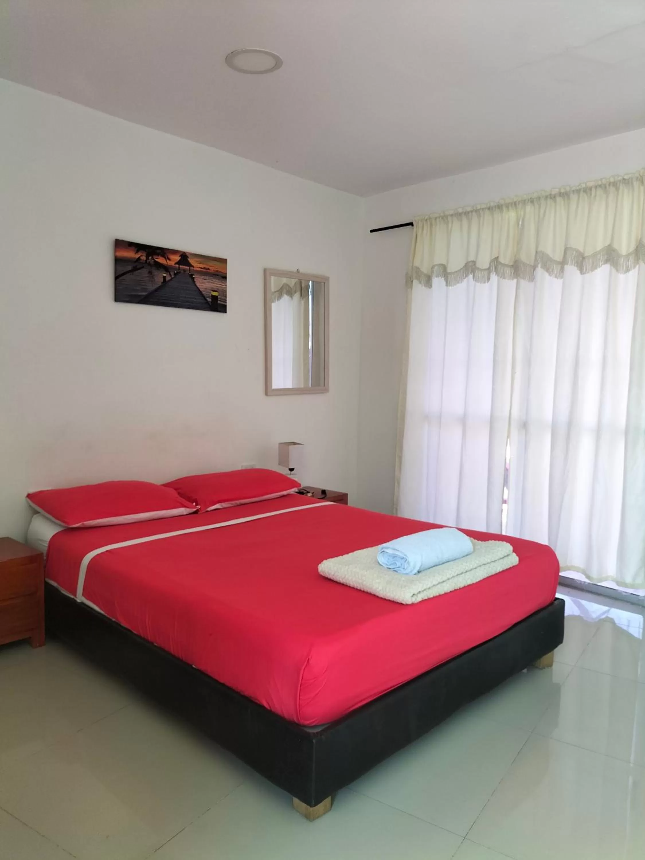 Bed in Posada Miss Joyce House